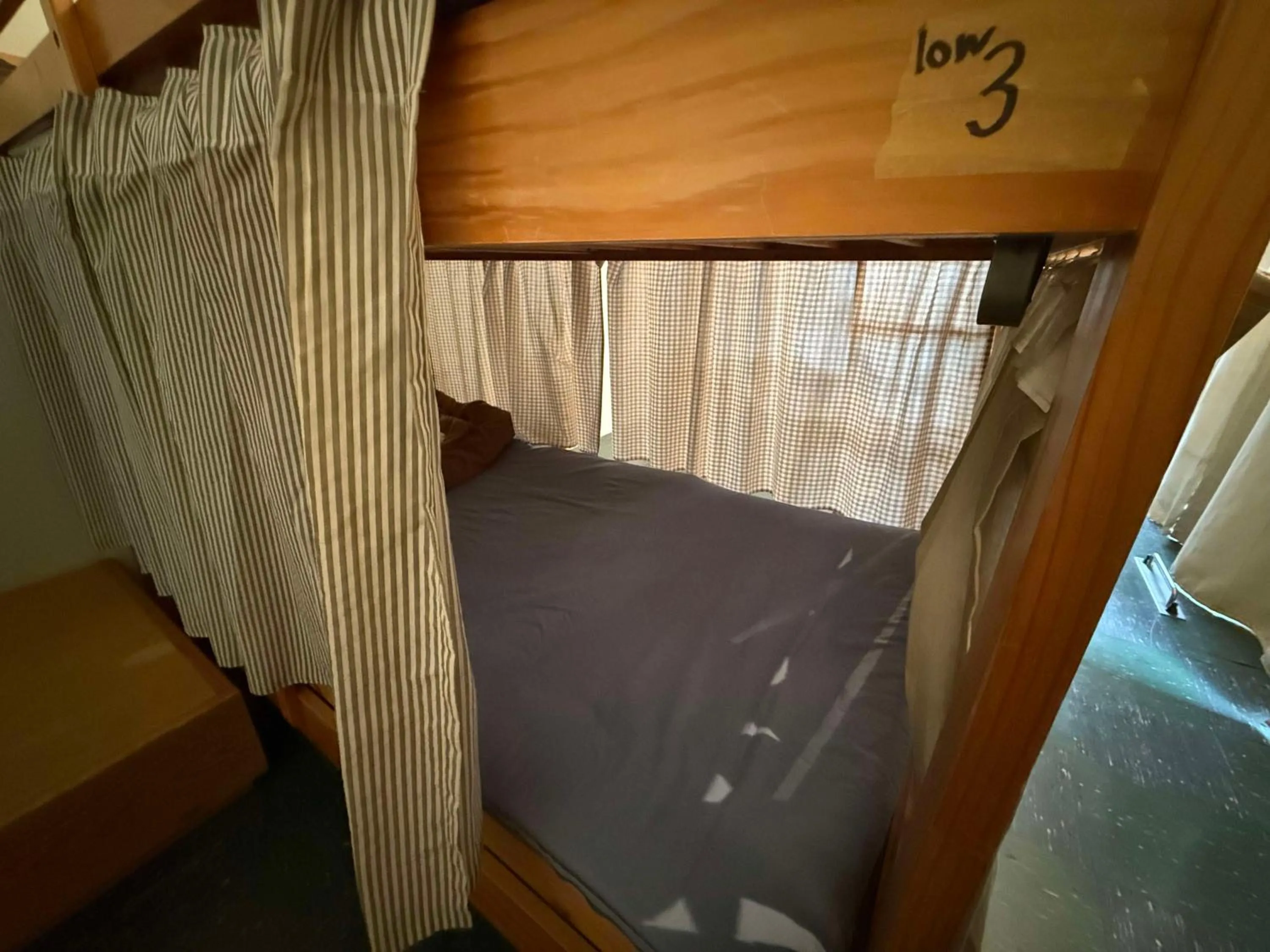 bunk bed, Bed in Kamp Houkan-cho Backpacker's Inn & Lounge