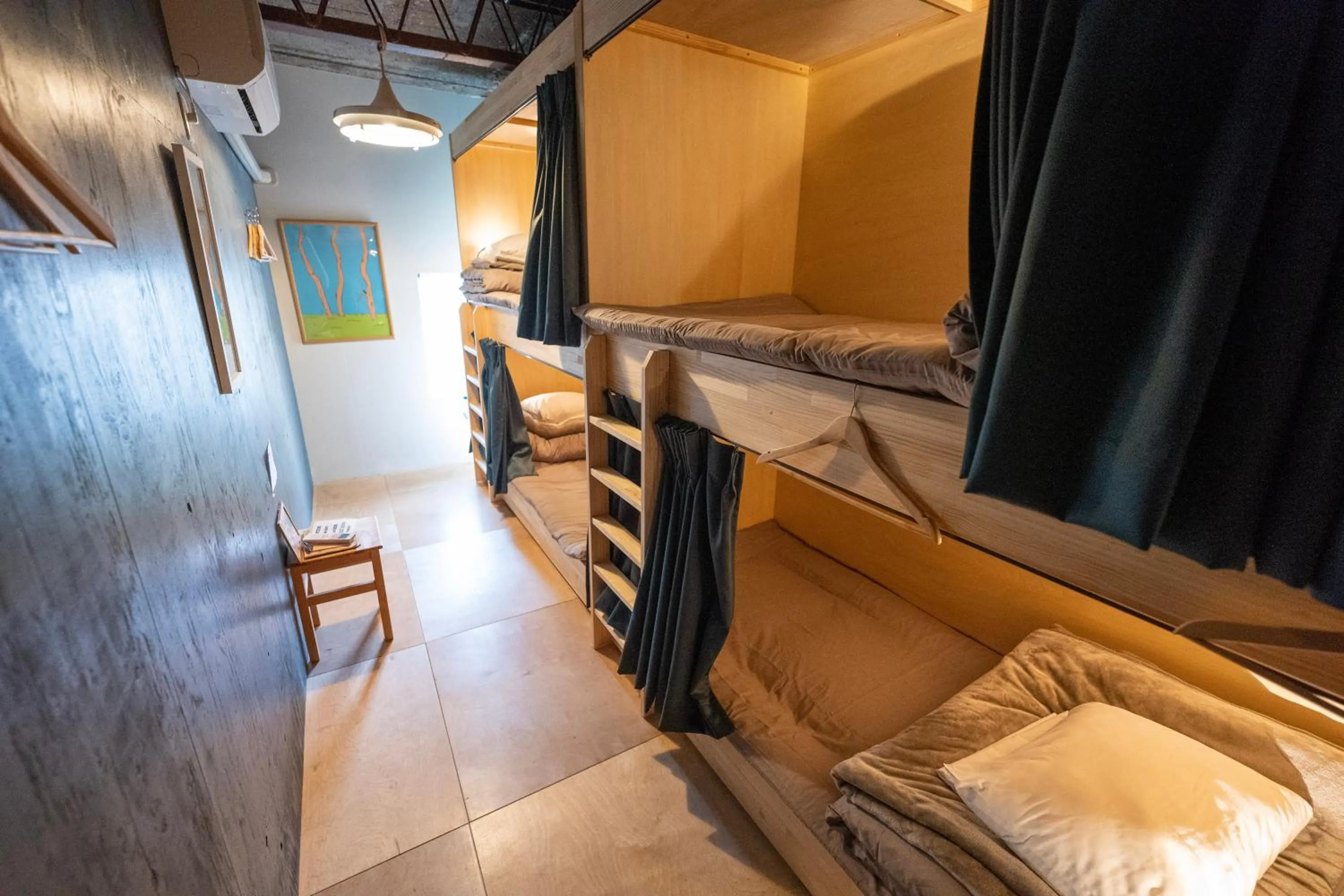 Bed in Kamp Houkan-cho Backpacker's Inn & Lounge