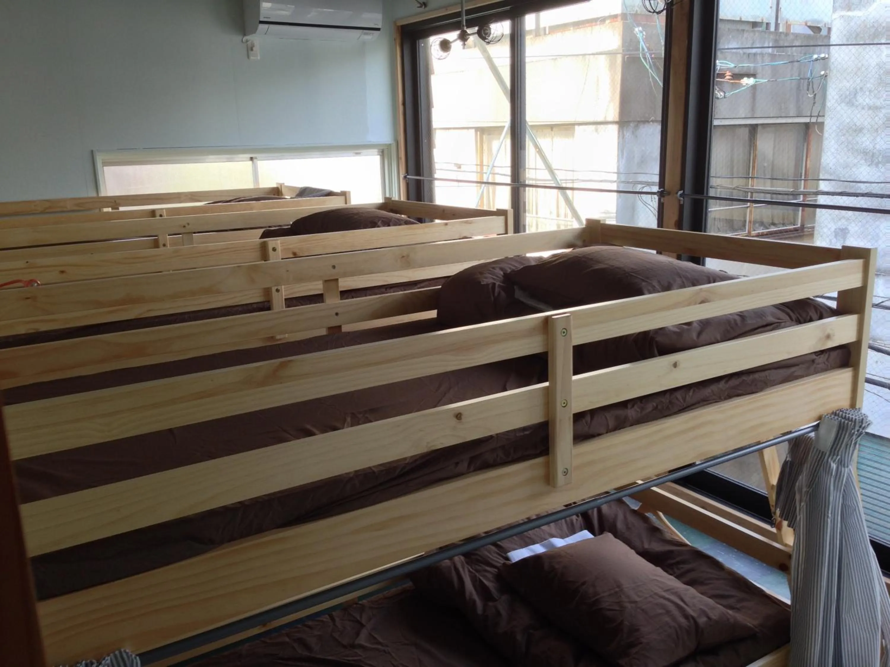 Bed in Kamp Houkan-cho Backpacker's Inn & Lounge