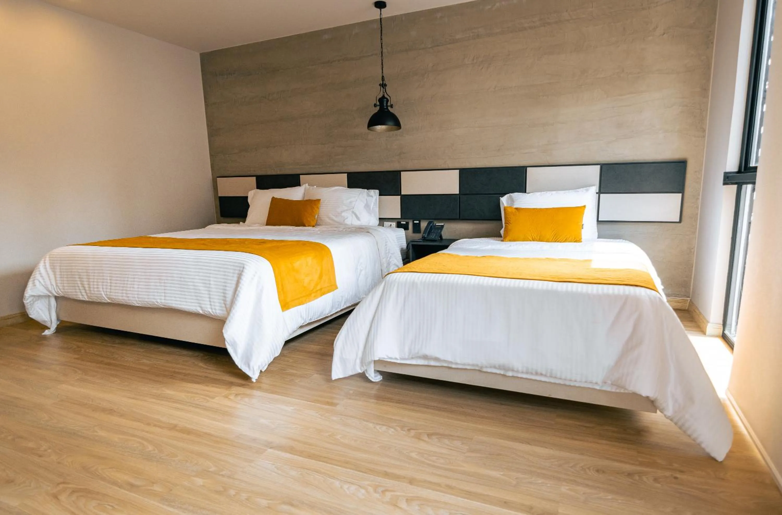 Bed in Balmoral Plaza Hotel