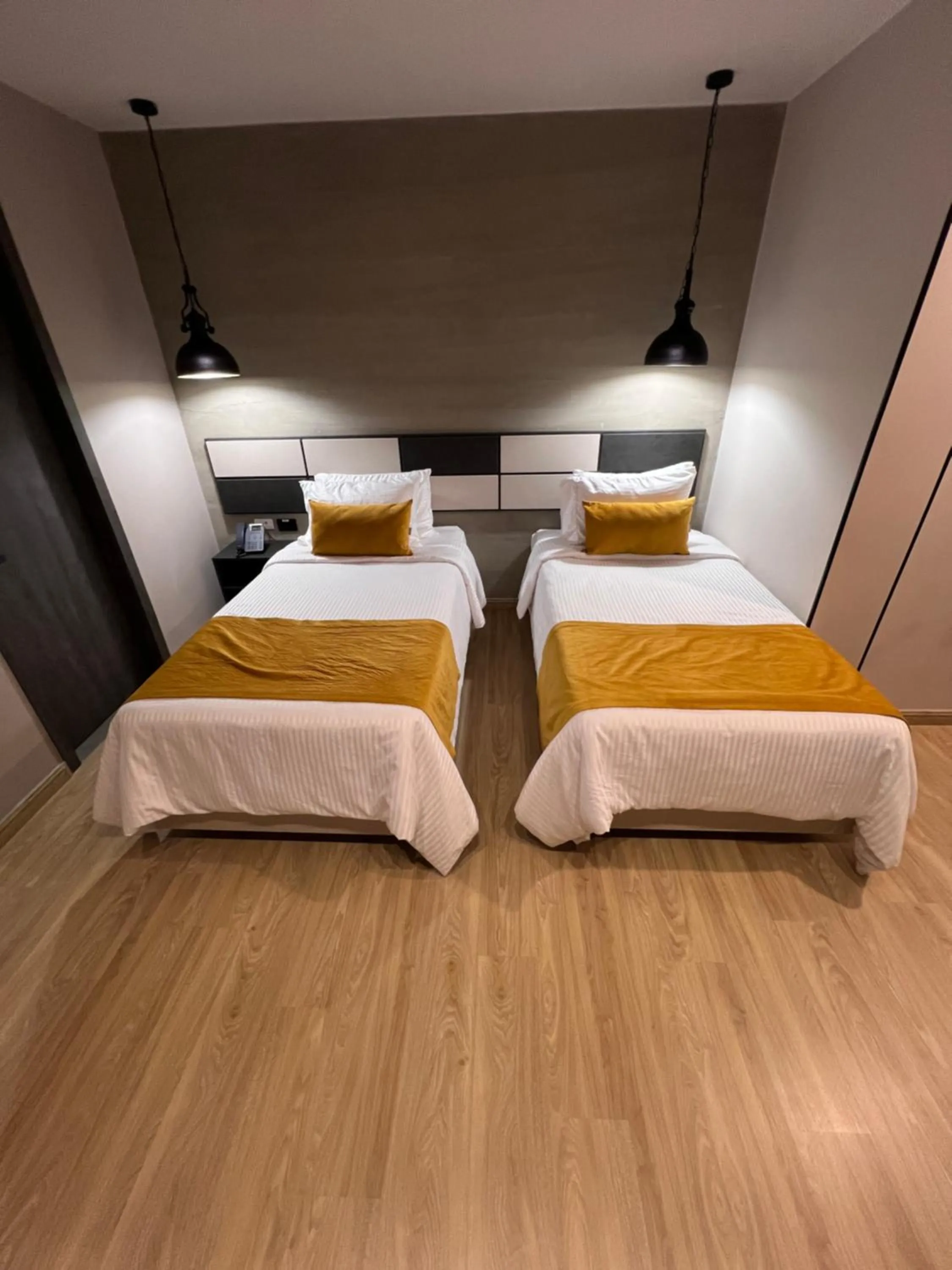 Bed in Balmoral Plaza Hotel