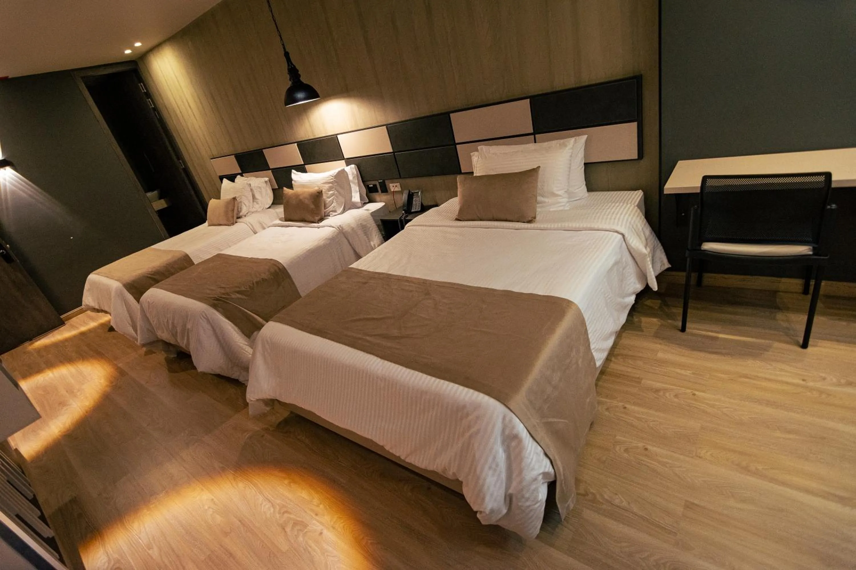 Bed in Balmoral Plaza Hotel