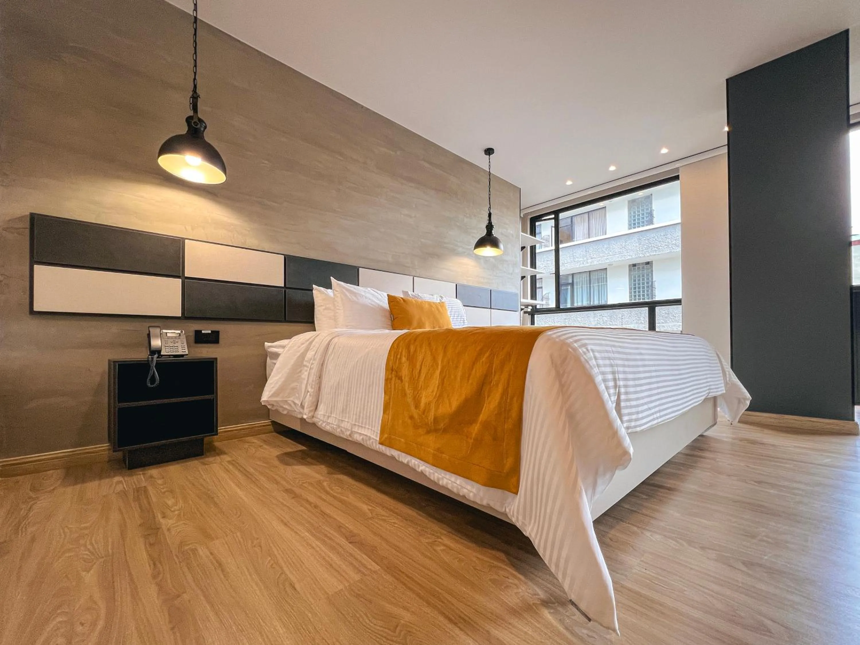 Bed in Balmoral Plaza Hotel