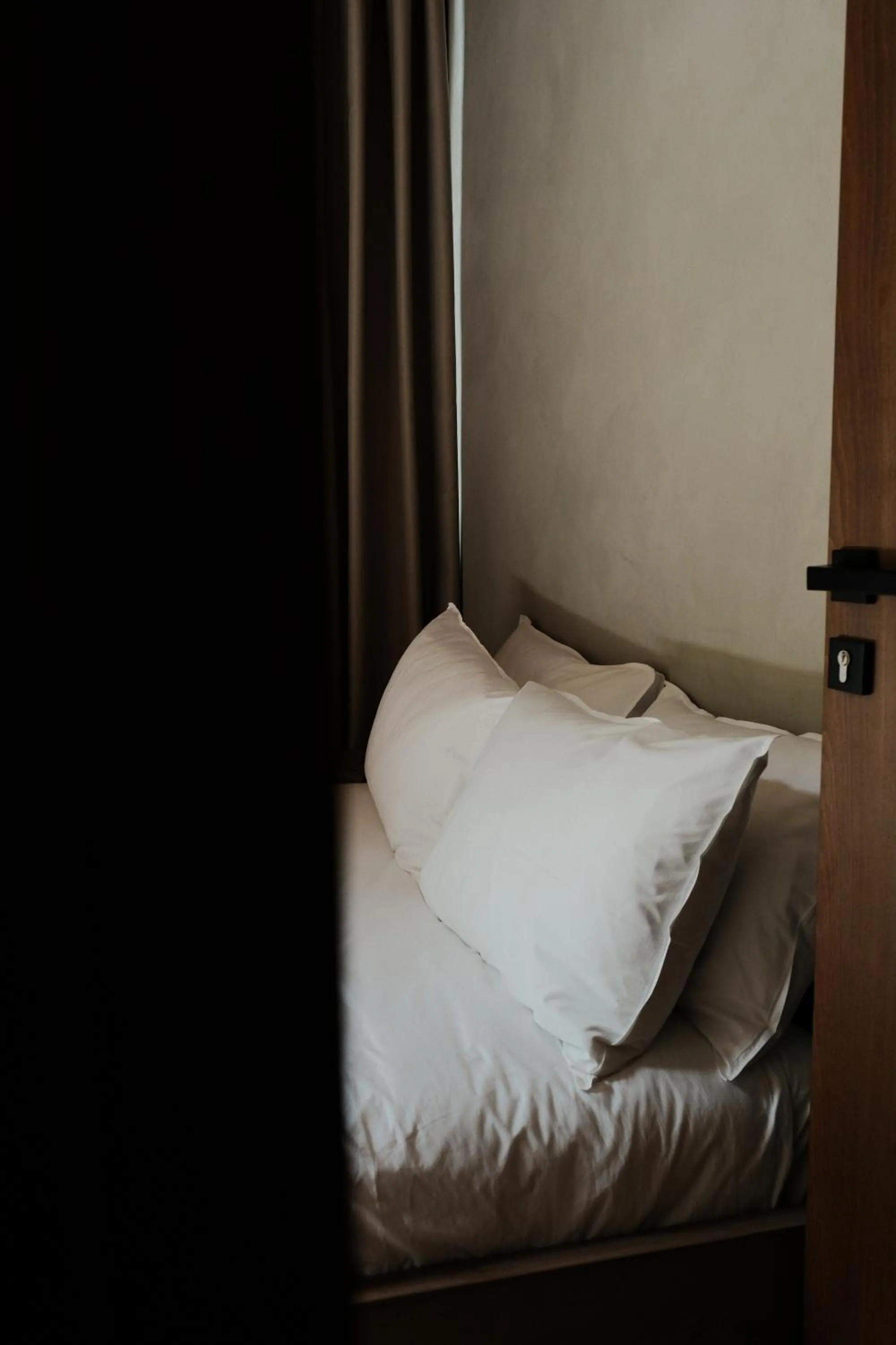 Bed in Faces & Places Boutique Hotel