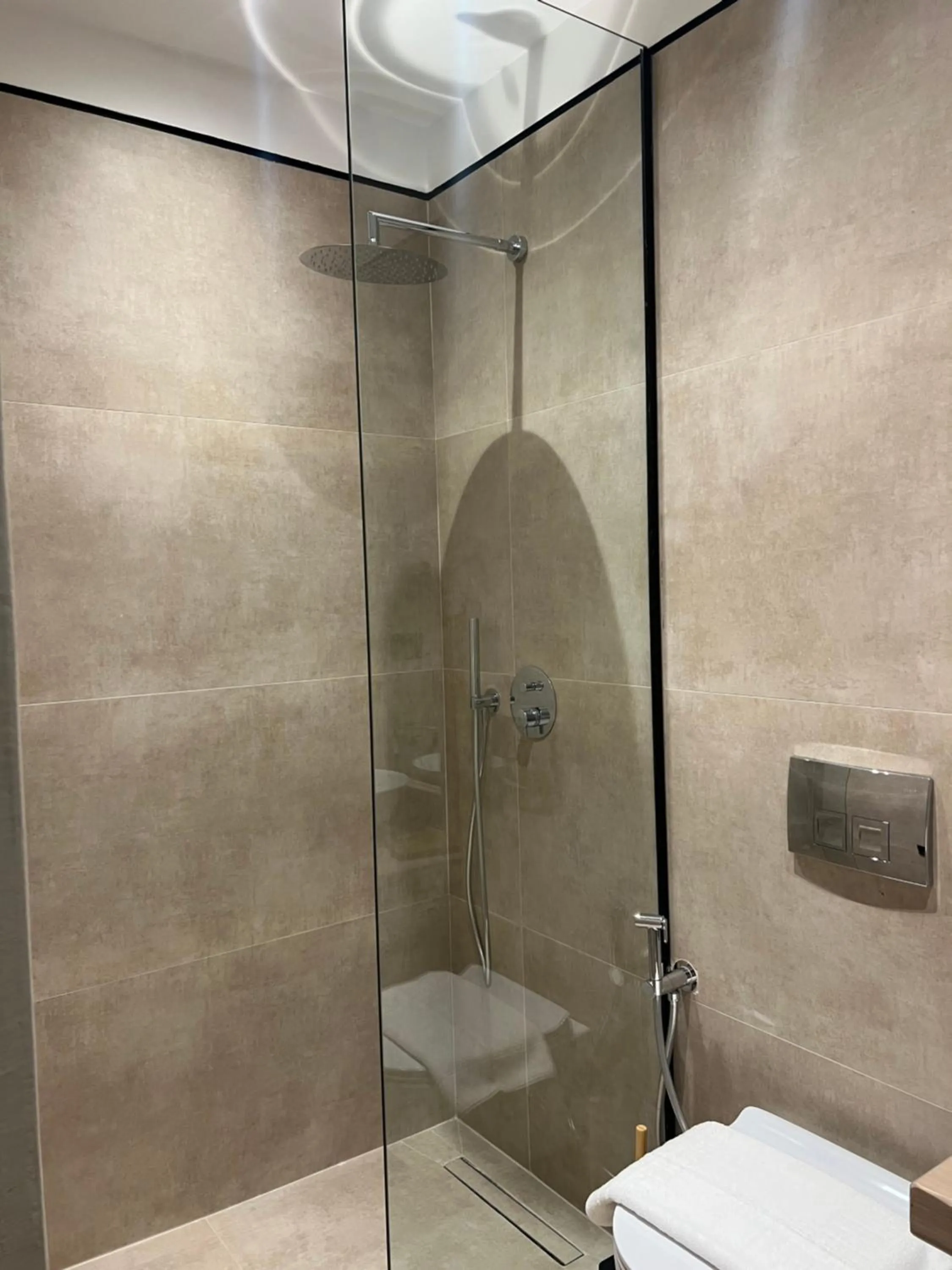 Shower in Faces & Places Boutique Hotel
