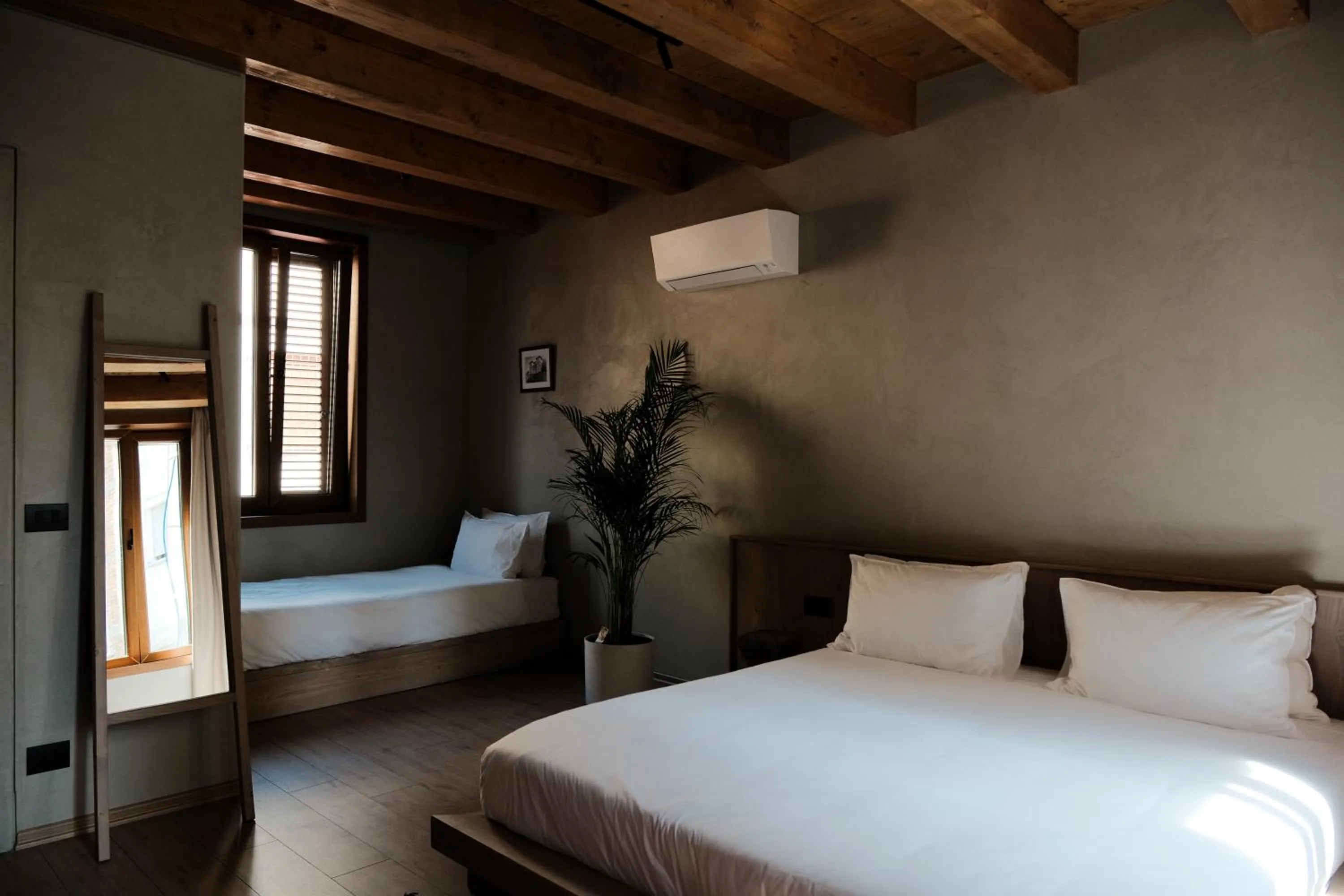 Bed in Faces & Places Boutique Hotel