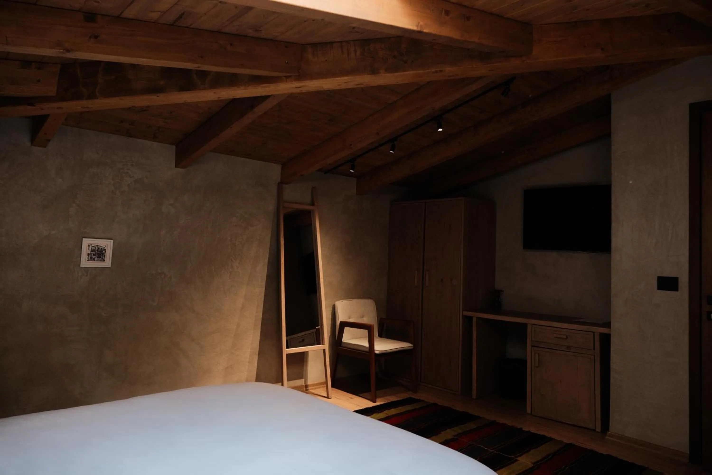 Bed in Faces & Places Boutique Hotel