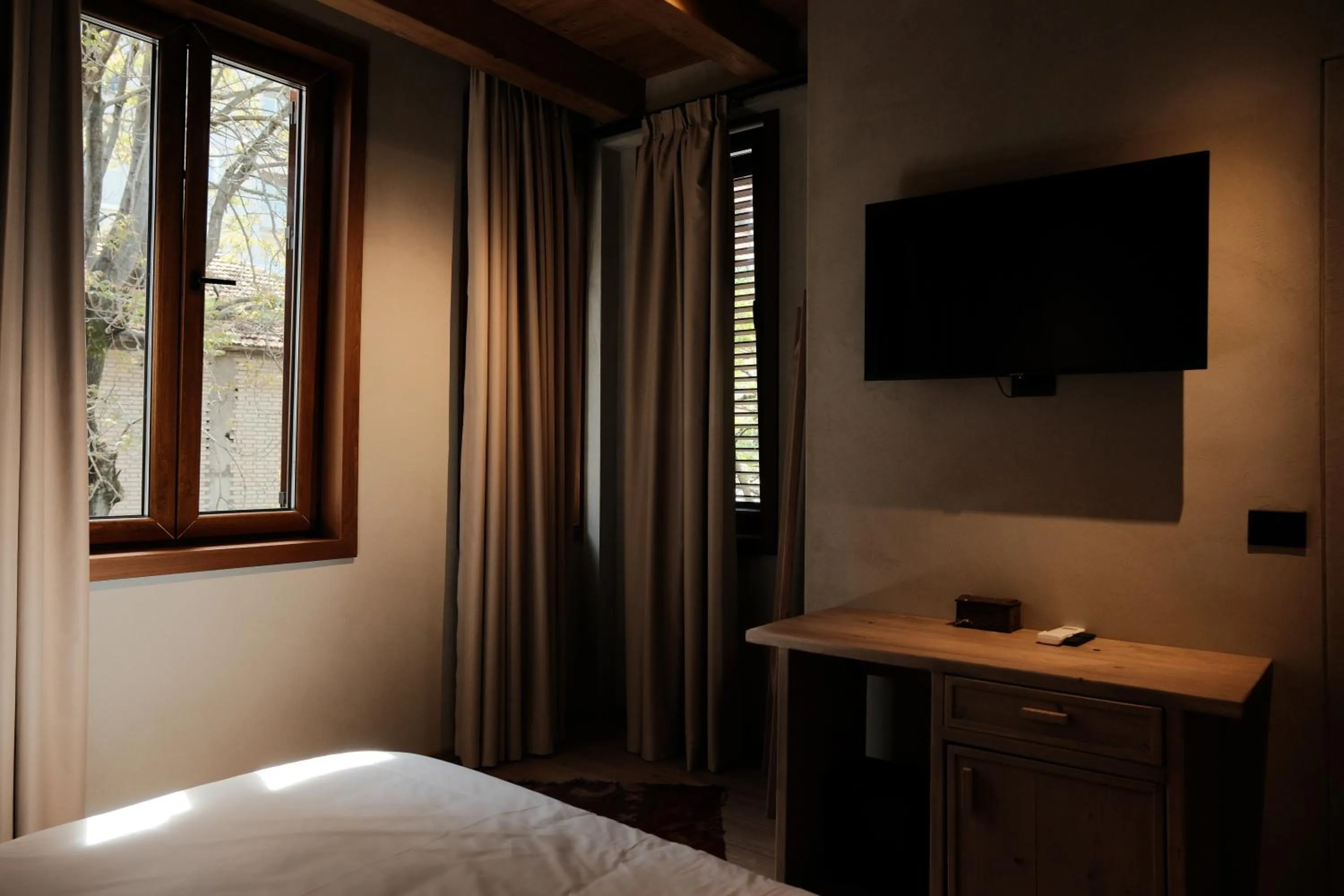 Bed in Faces & Places Boutique Hotel