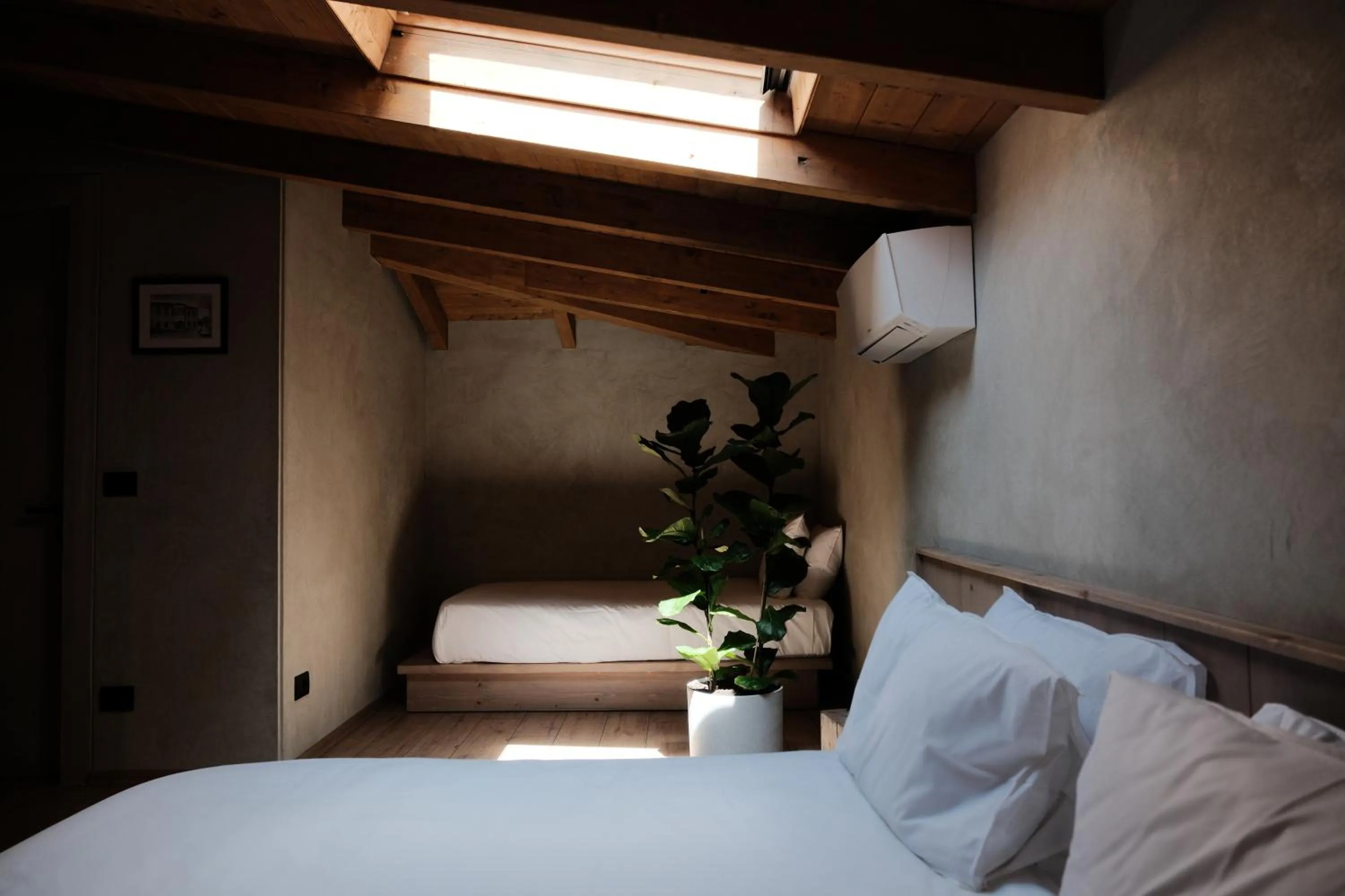 Bed in Faces & Places Boutique Hotel