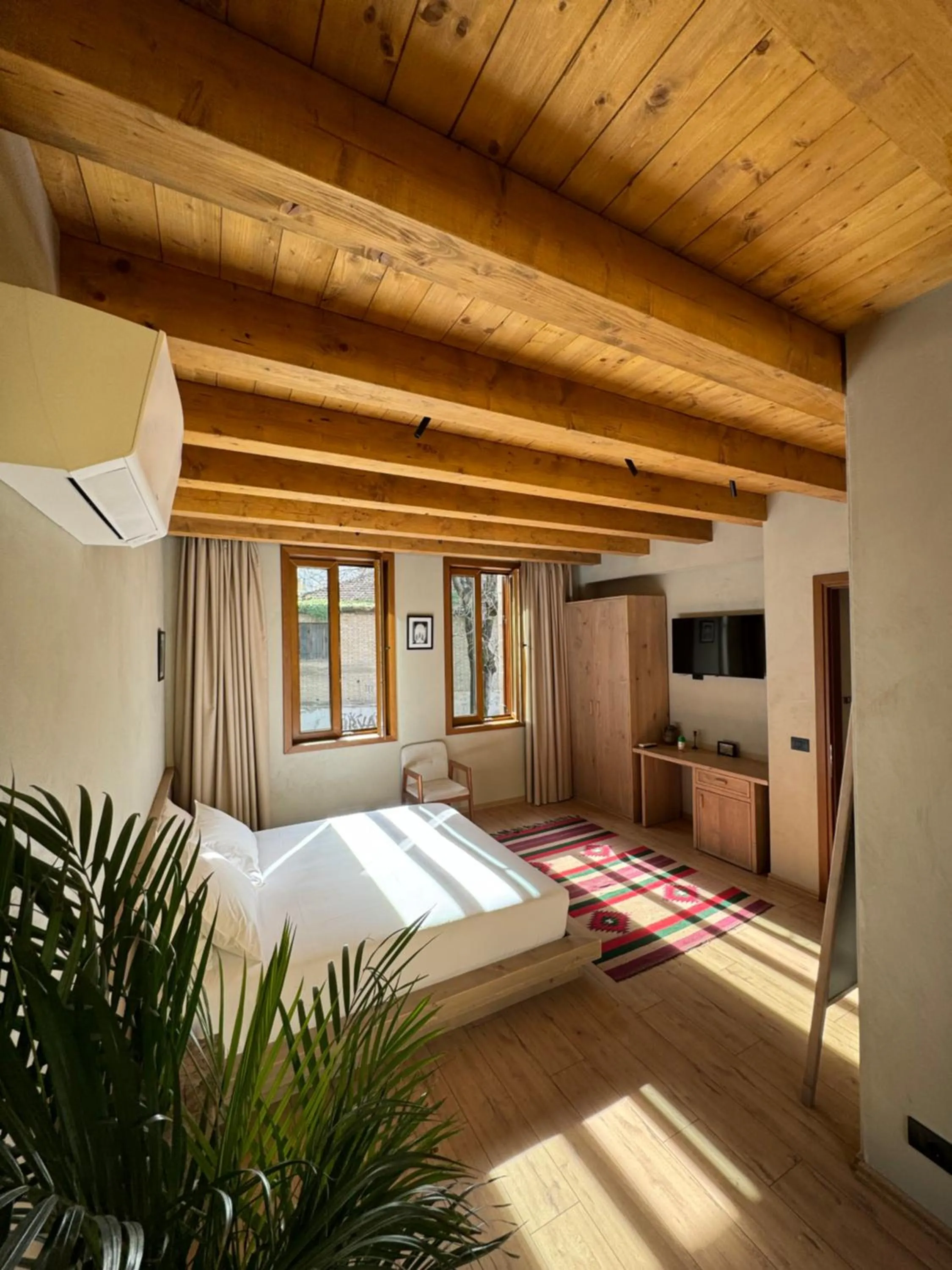 Bed in Faces & Places Boutique Hotel