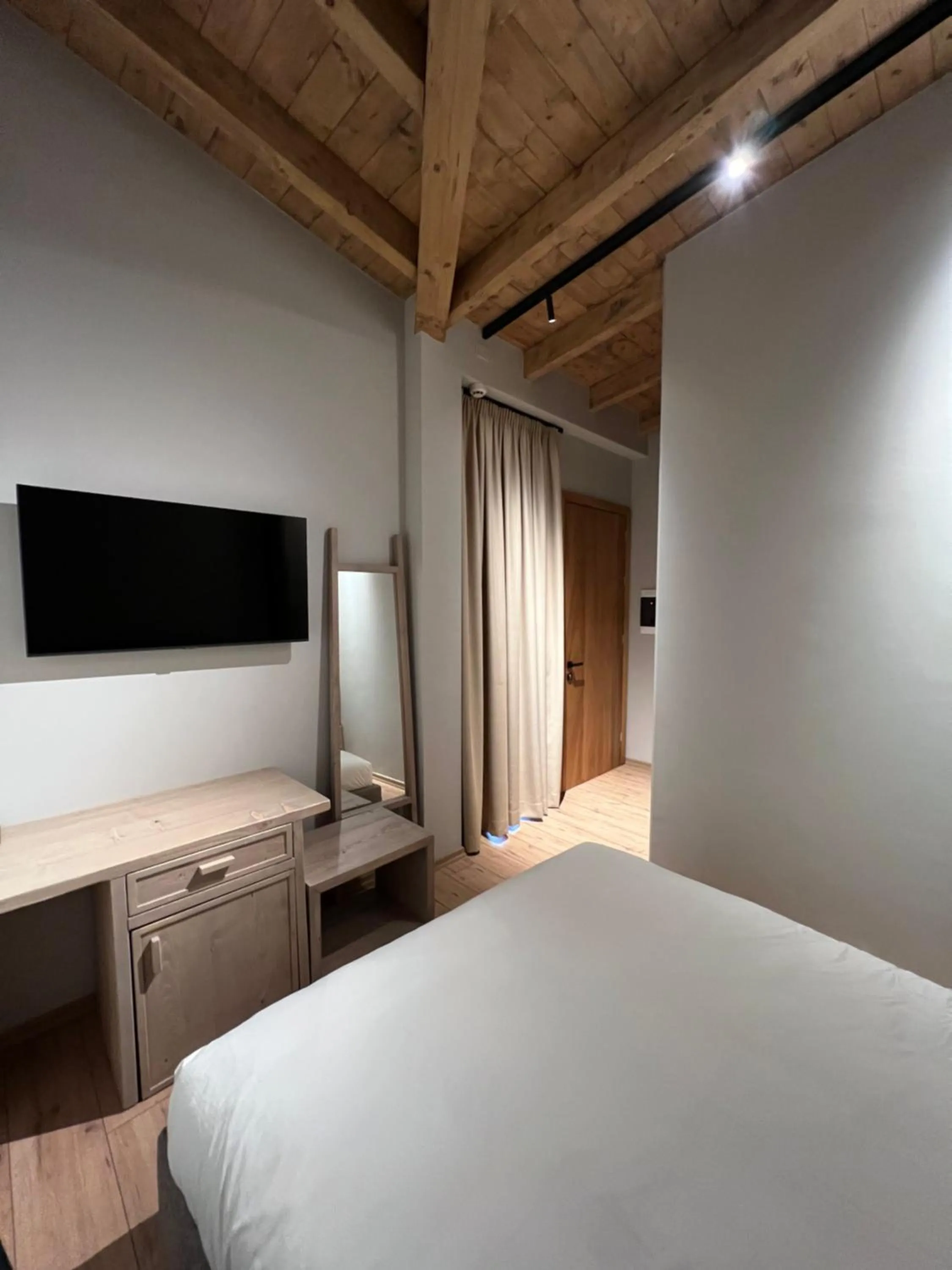 Bed in Faces & Places Boutique Hotel