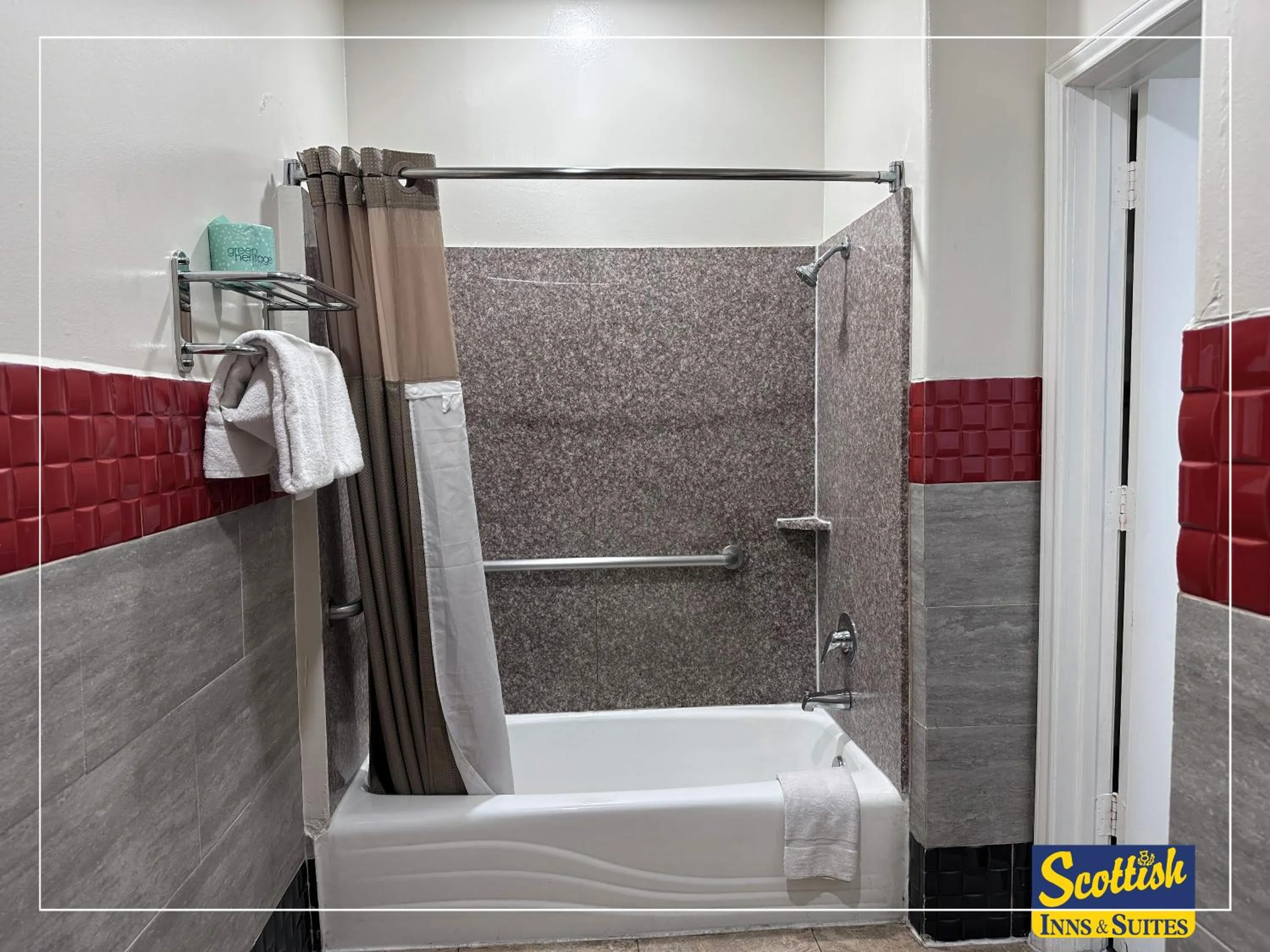 Shower in Scottish Inn & Suites Sam Houston Parkway