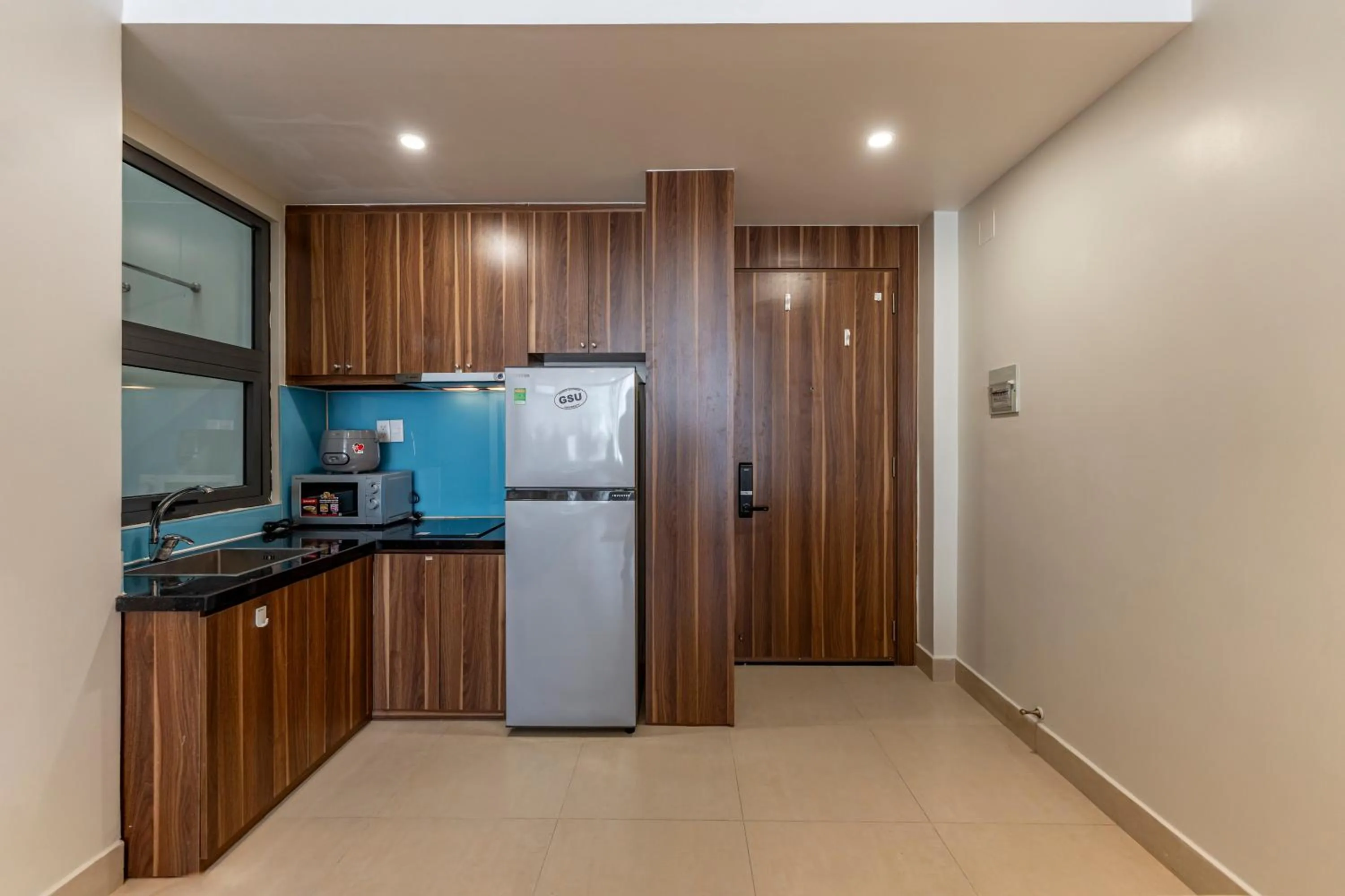 Kitchen or kitchenette in Thanh Long Hotel - Apartment
