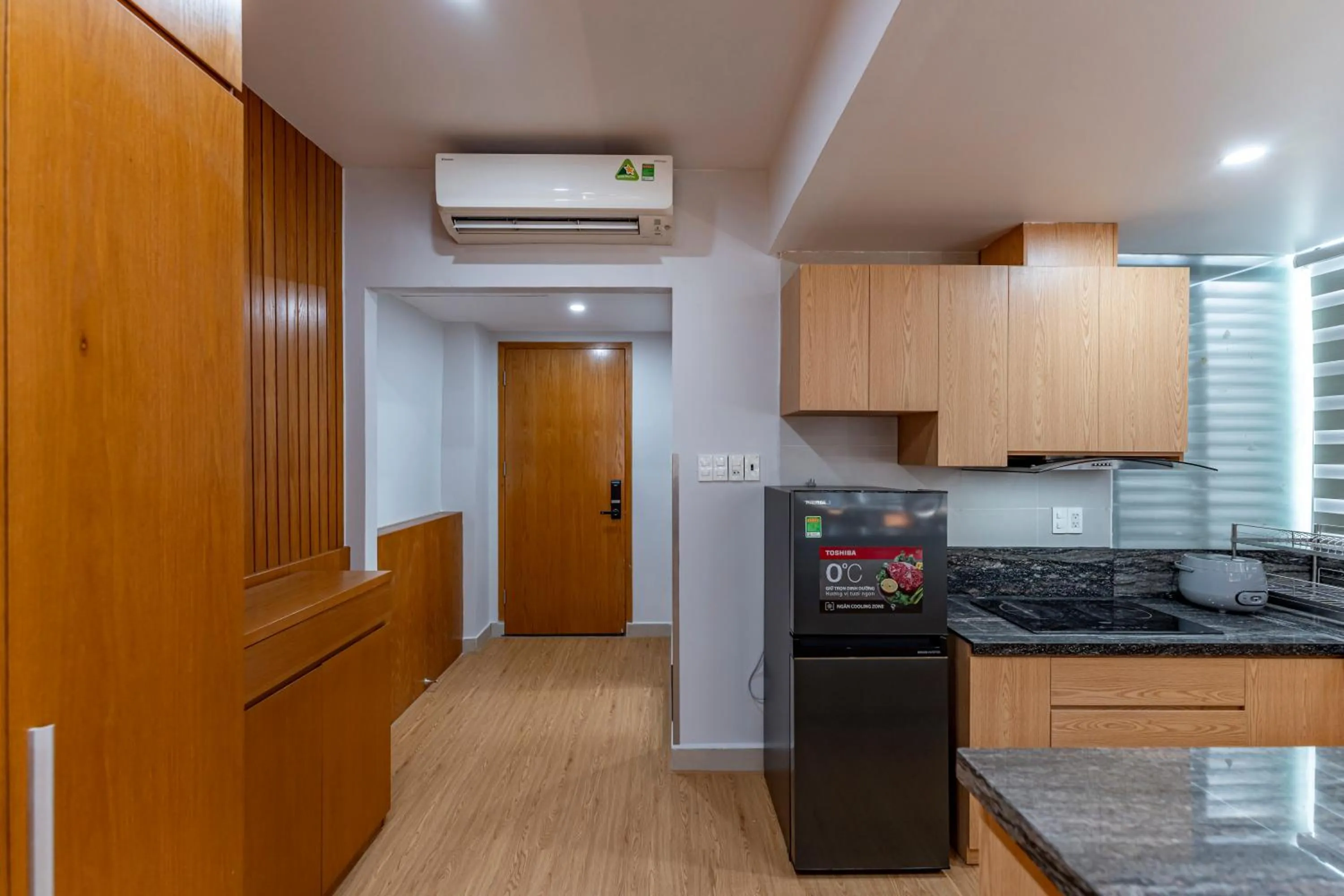 Kitchen or kitchenette in Thanh Long Hotel - Apartment