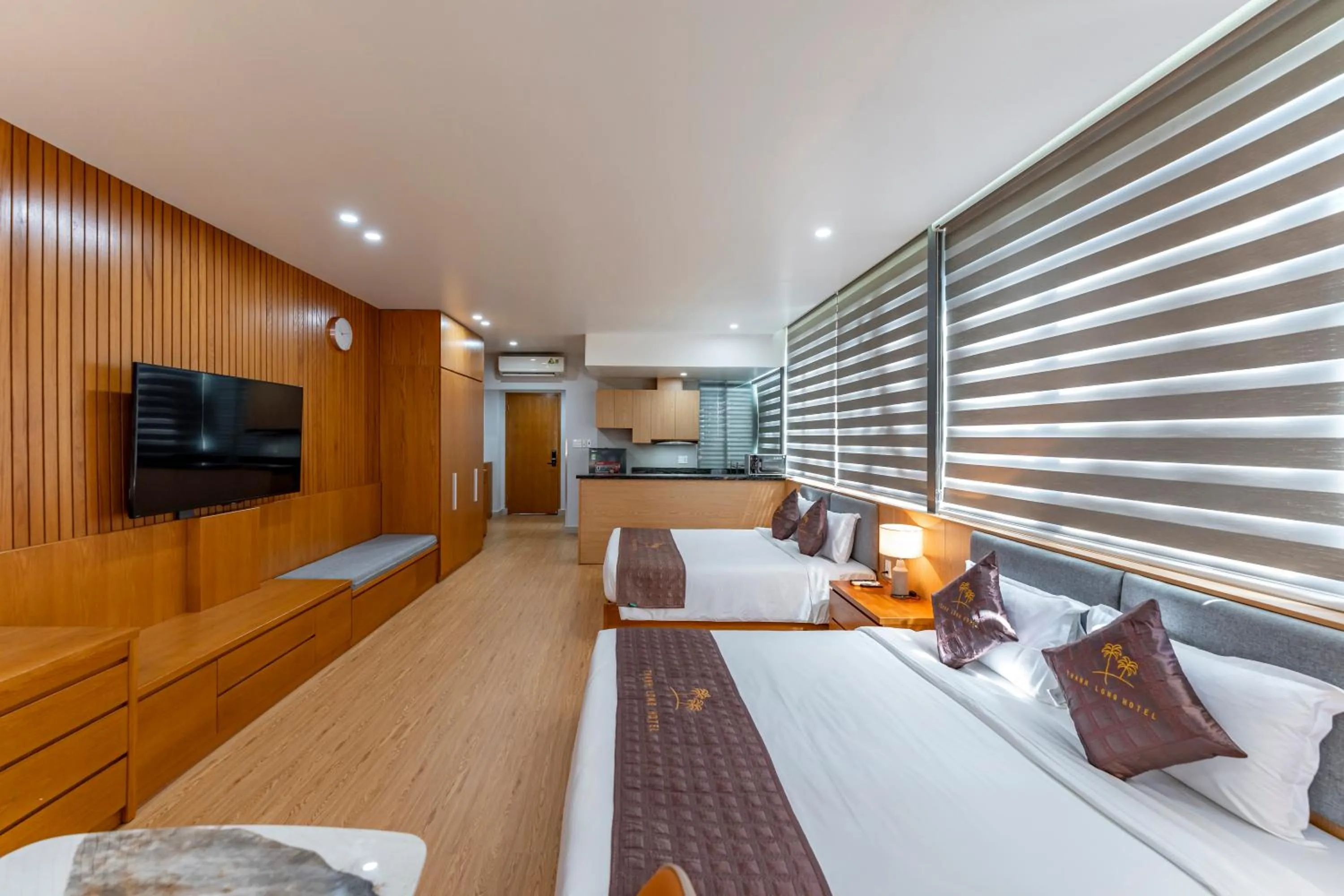 Communal lounge/ TV room in Thanh Long Hotel - Apartment