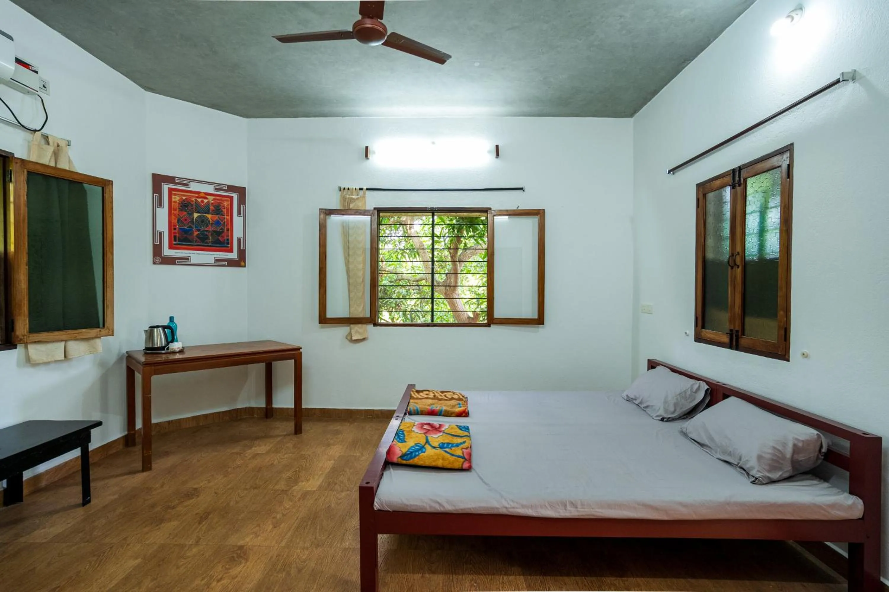Bed in Aurovidya Retreat