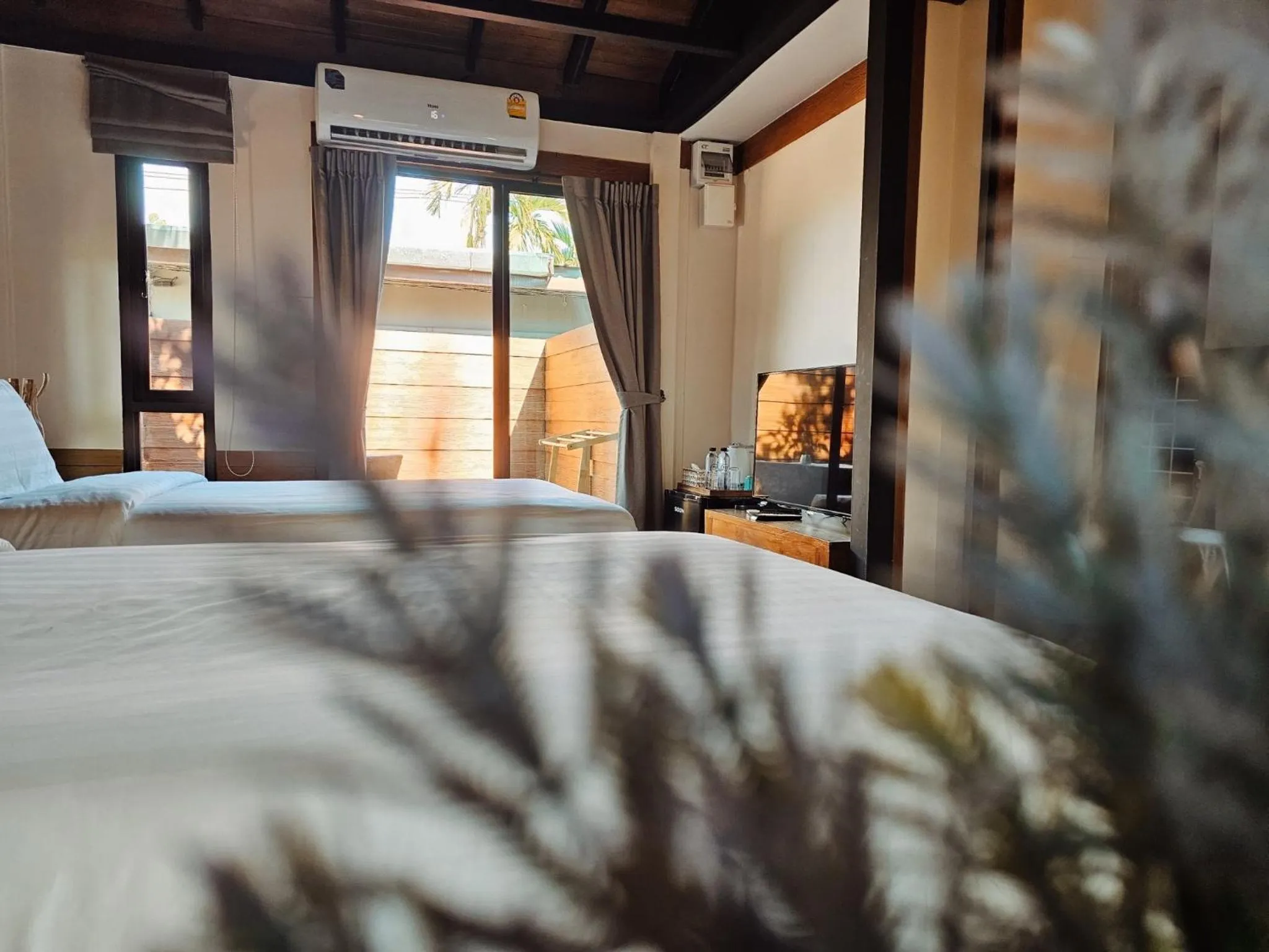 Bed in R1 Resort Rajapruek Chiangmai