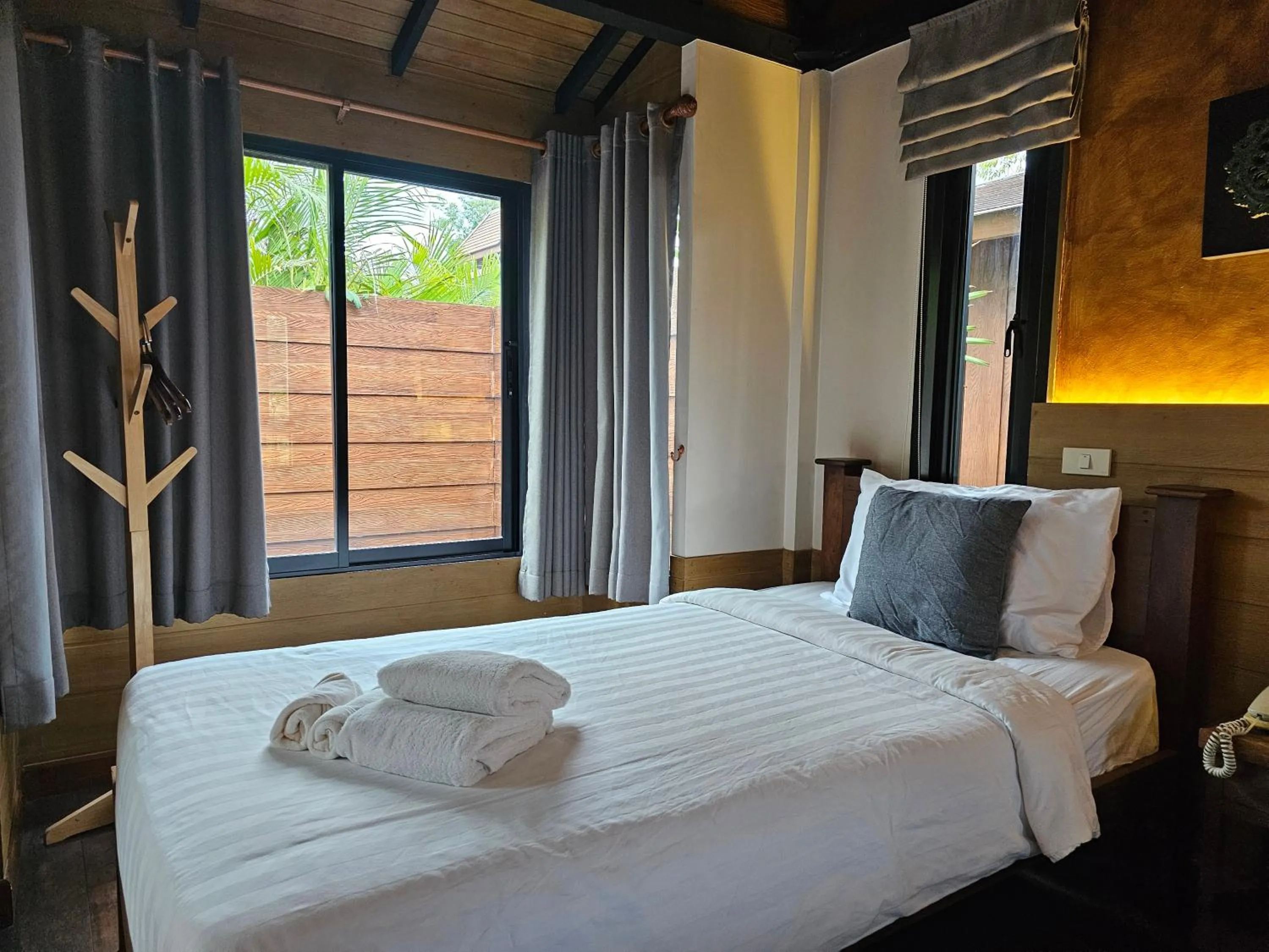 Bed in R1 Resort Rajapruek Chiangmai