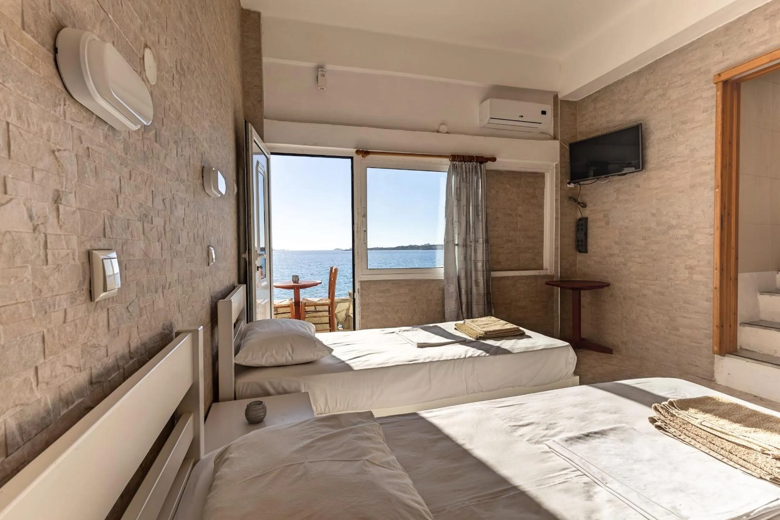 Bed in Petalides Apartments