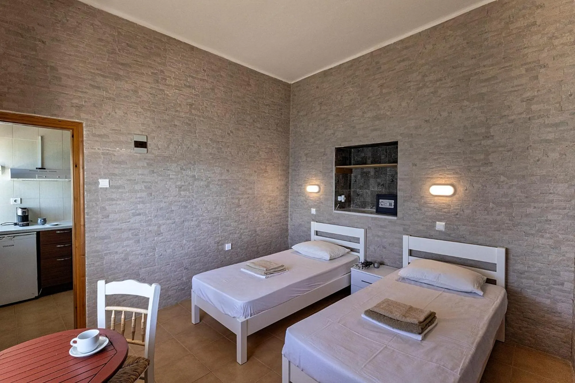 Bed in Petalides Apartments
