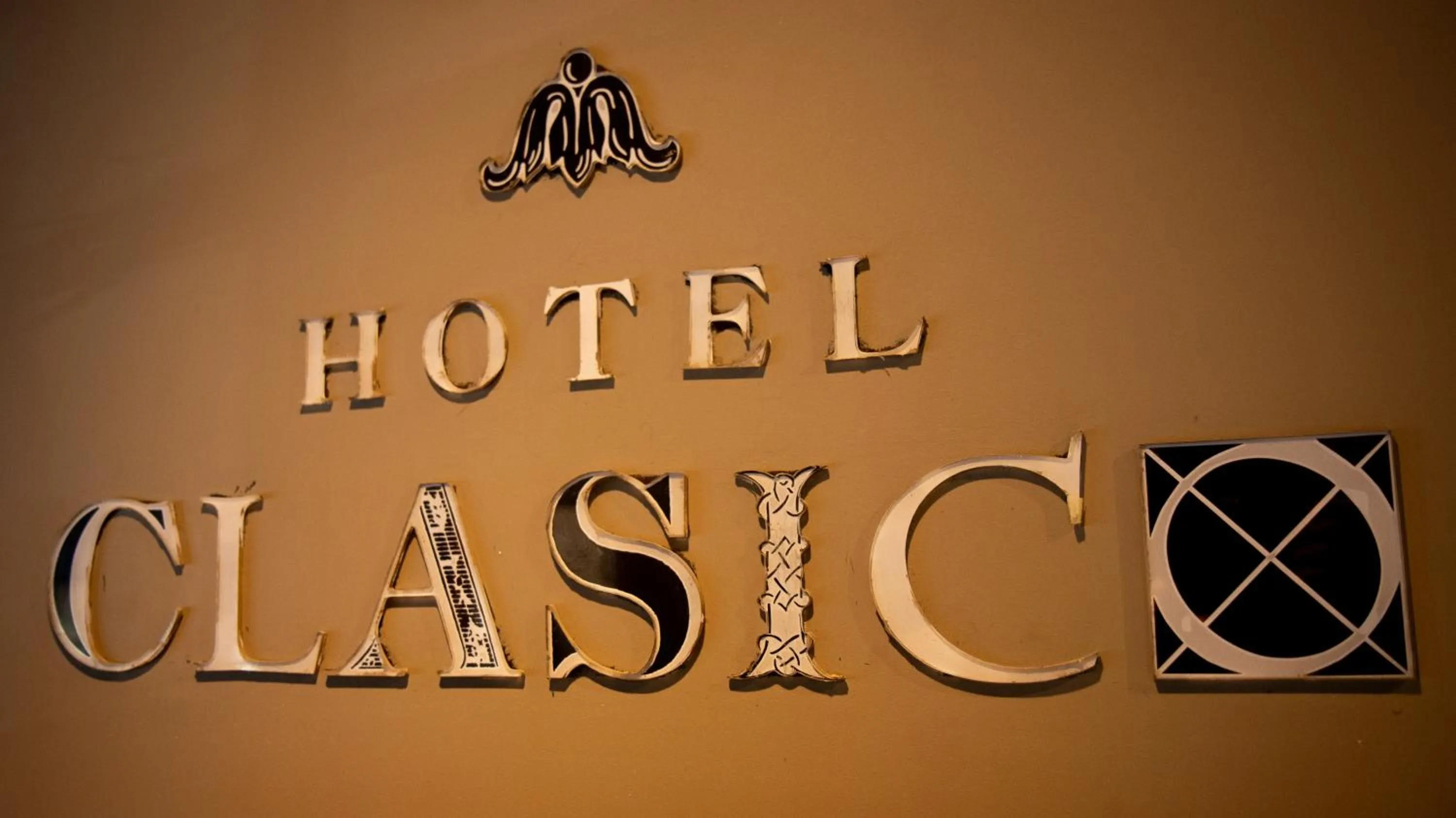 Property logo or sign in Hotel Clasico