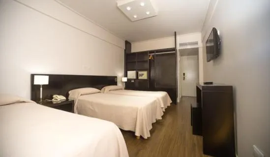 Bed in Hotel Versailles