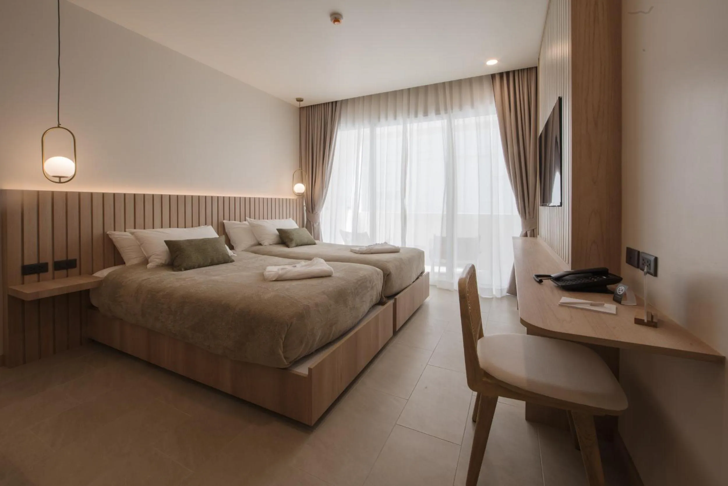 Bed in Niranapa Boutique Resort