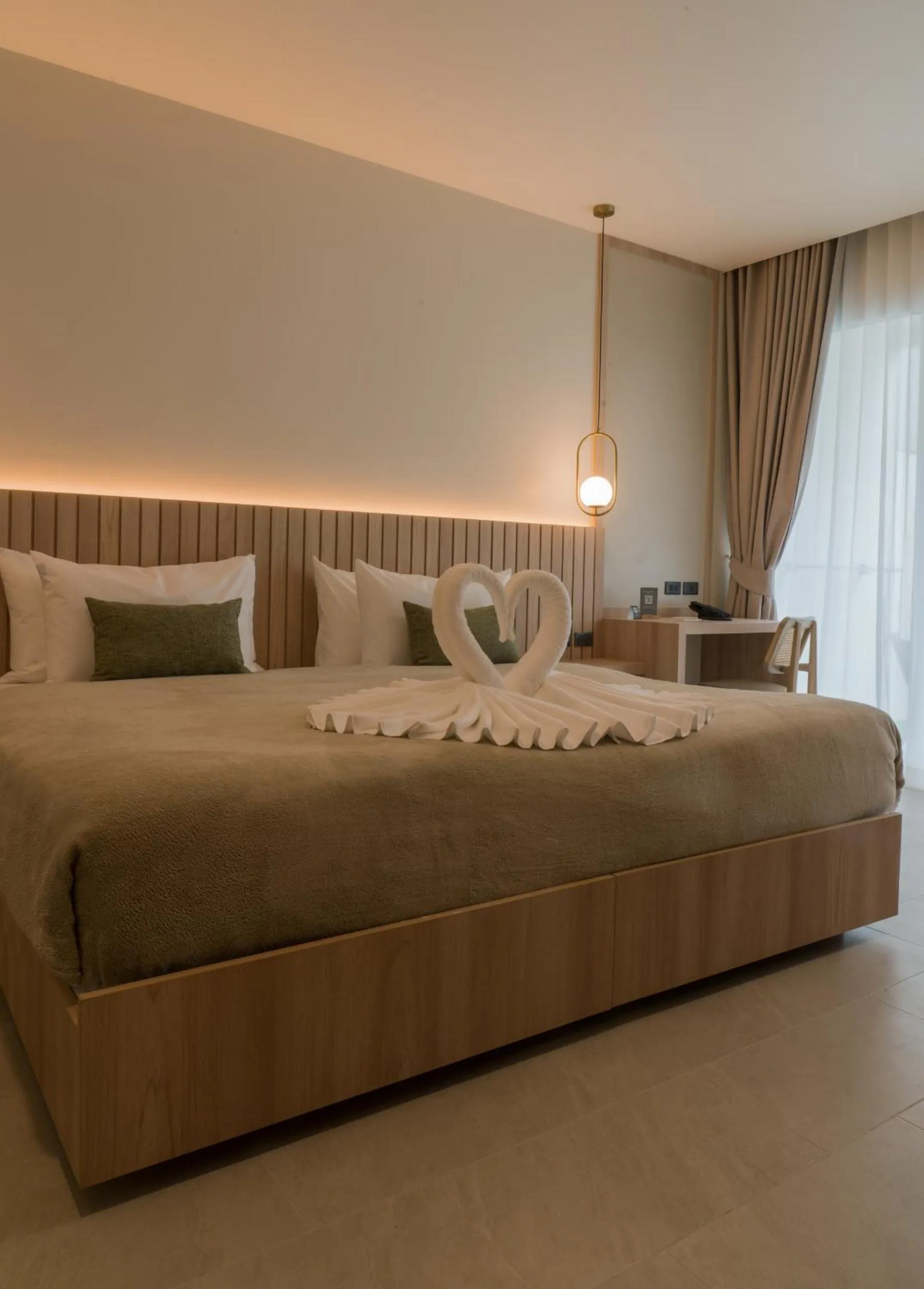 Bed in Niranapa Boutique Resort