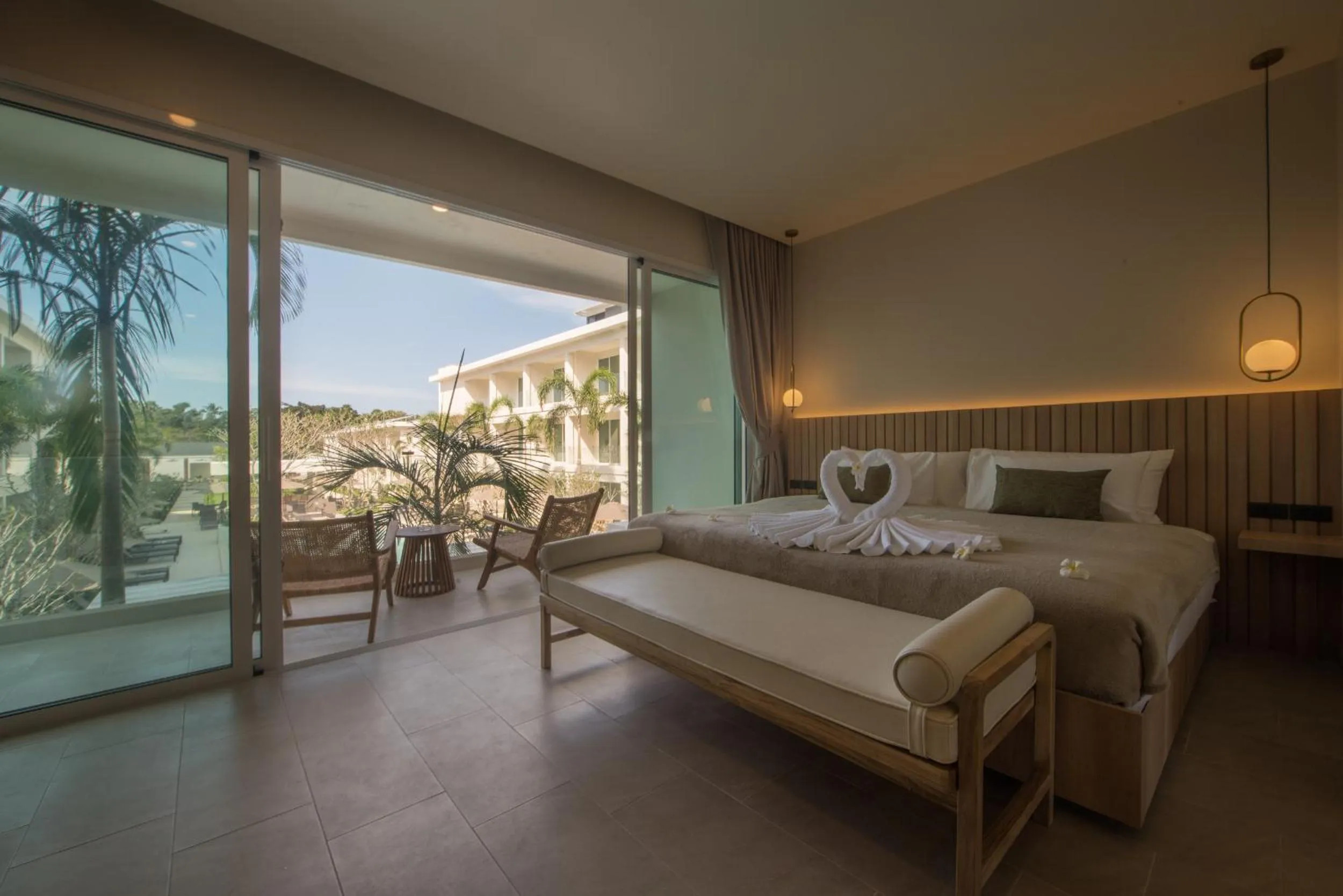 Bed in Niranapa Boutique Resort