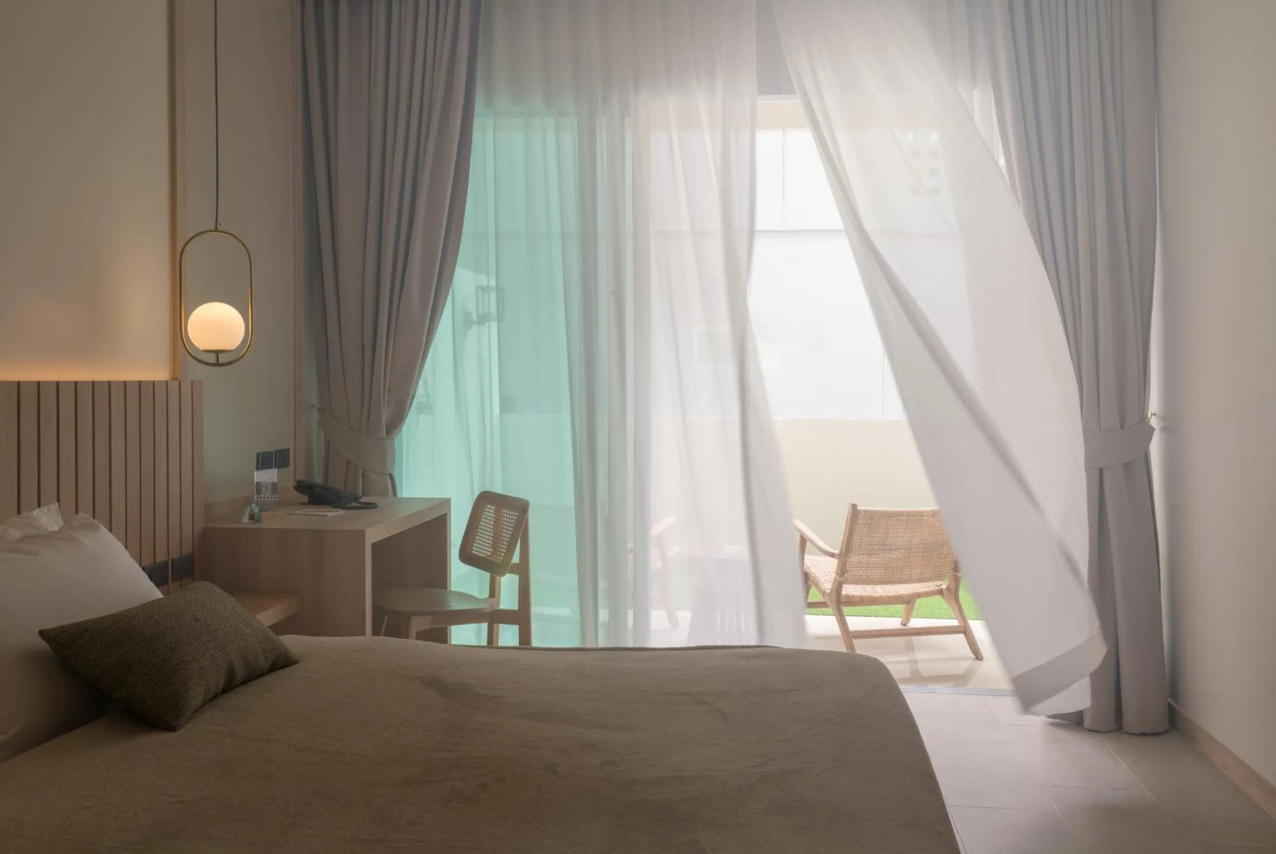 Seating area, Bed in Niranapa Boutique Resort