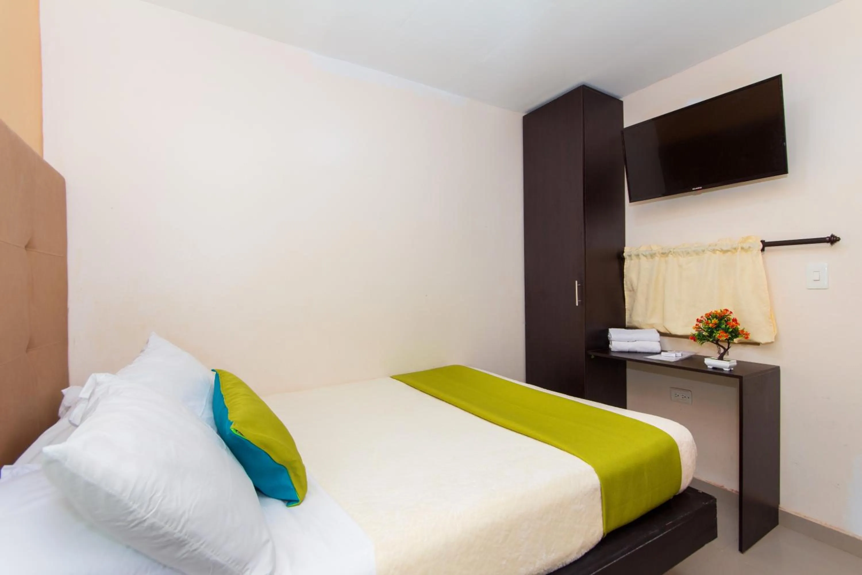 Photo of the whole room, Bed in Azuán Suites Hotel By GEH Suites