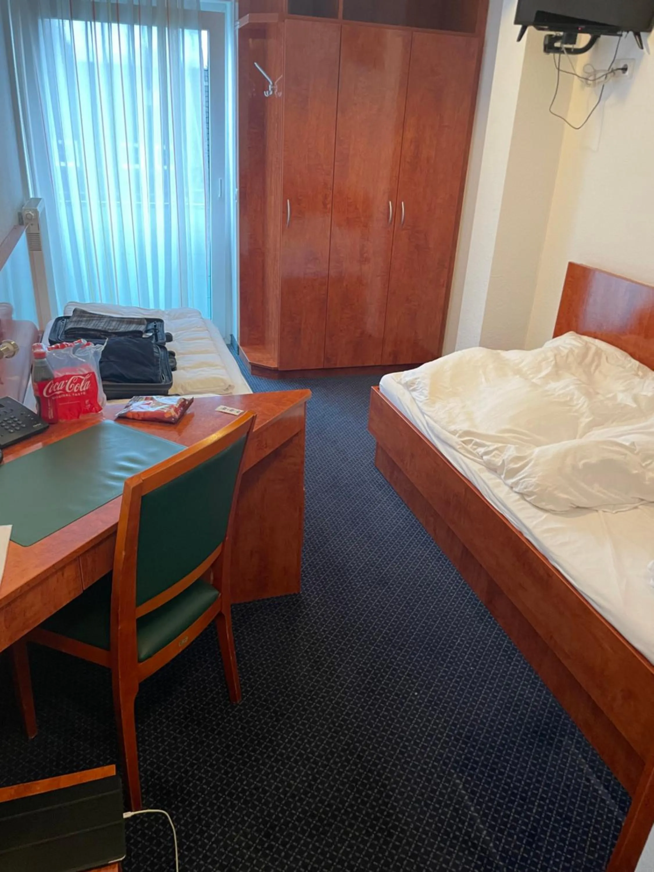 Bed in Hotel Merkenich