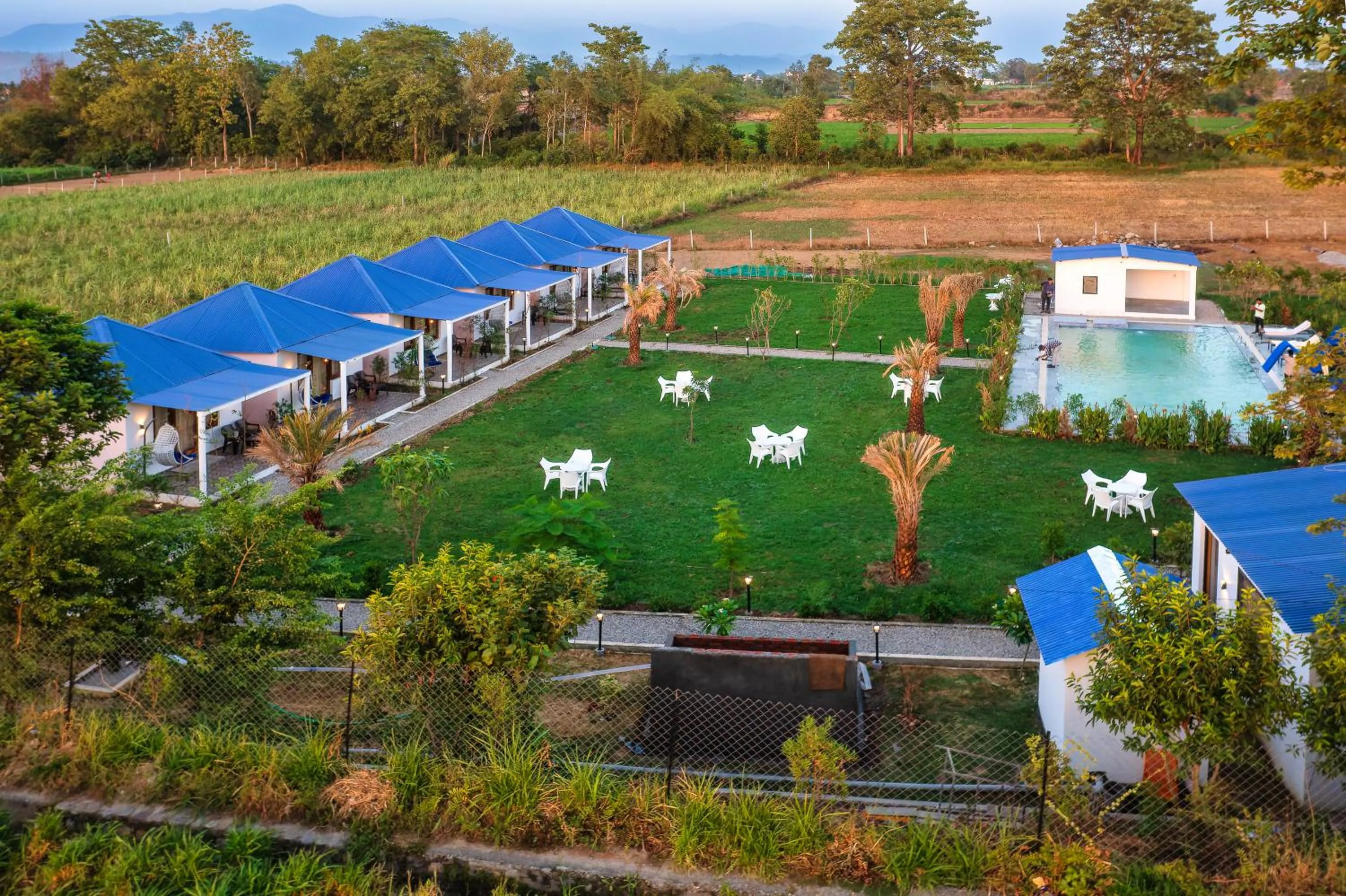 Garden in Wild Planets Corbett Resort, 2 Kms from Anantum Gateway Resorts