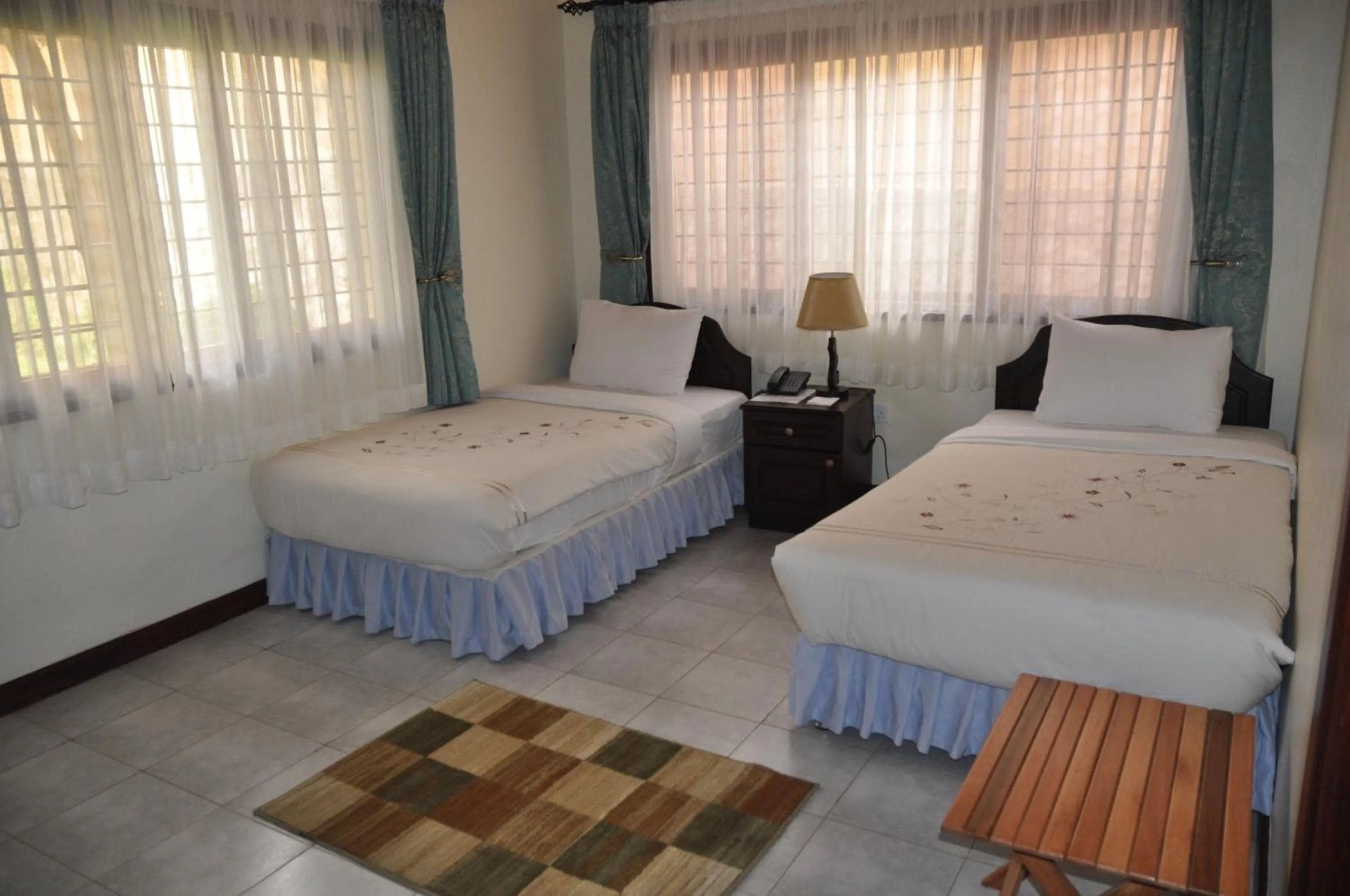 Bedroom in The Milimani Lodge