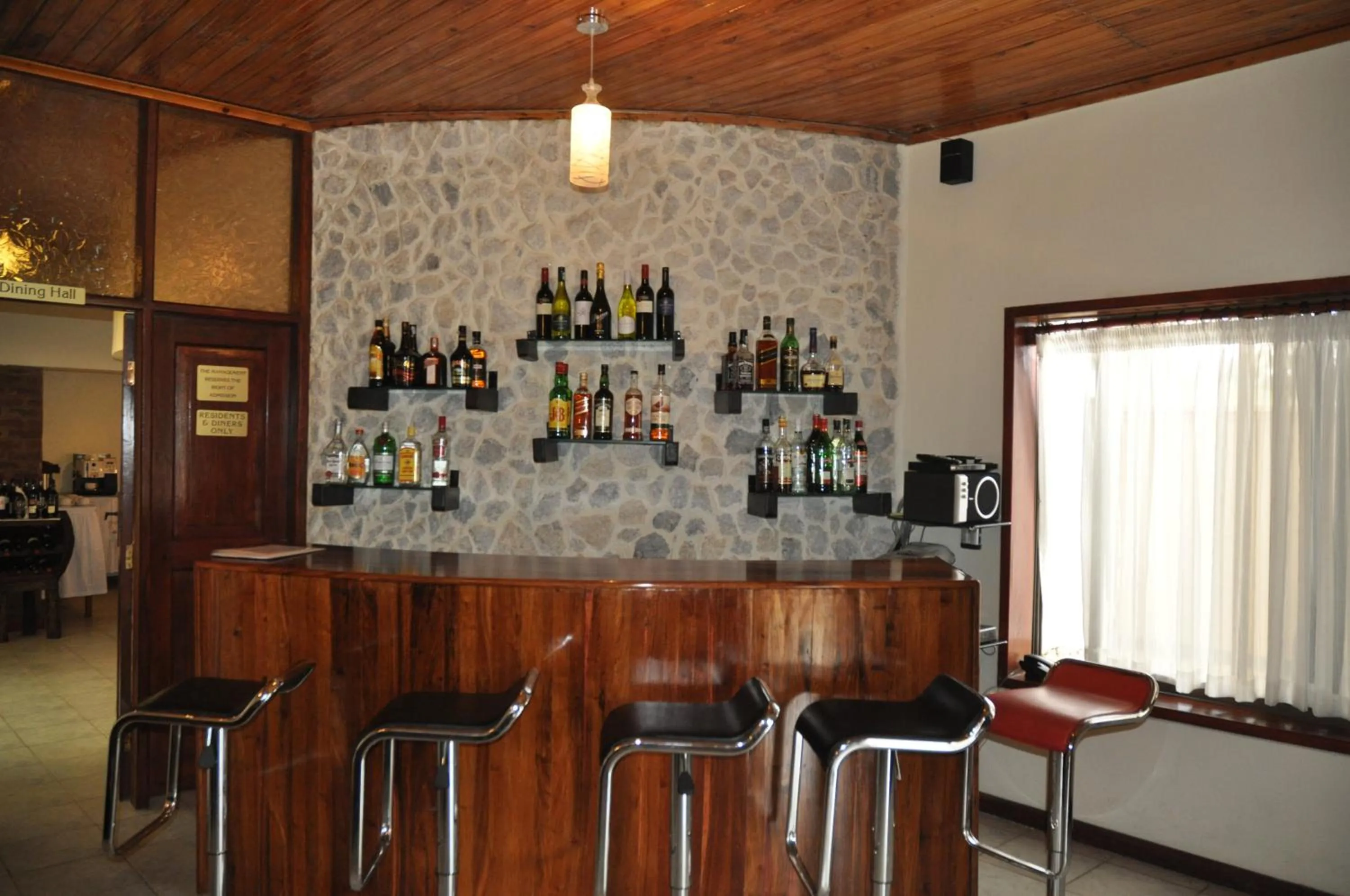Lounge or bar in The Milimani Lodge