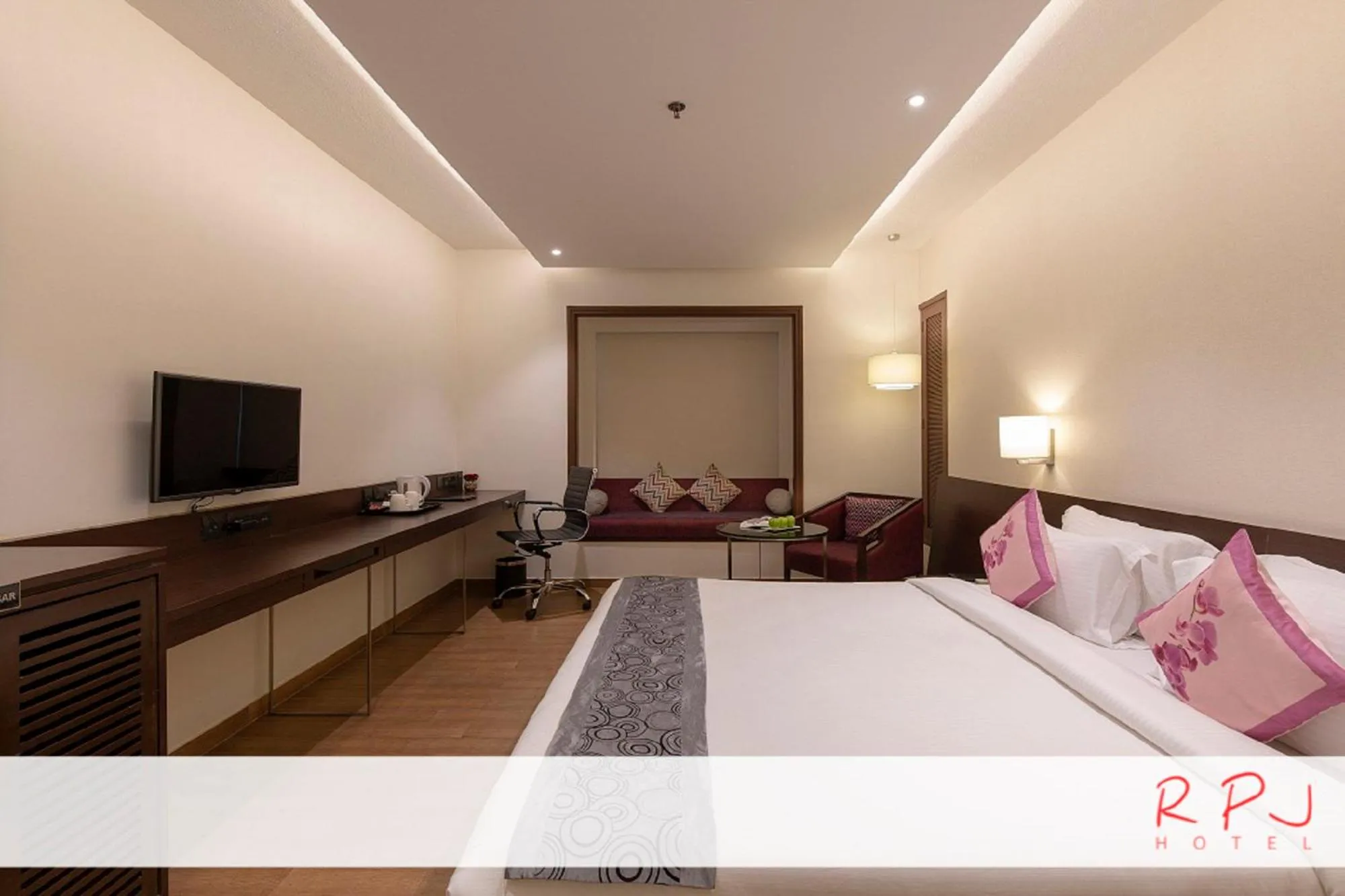Photo of the whole room, Bed in RPJ Hotel Rajkot
