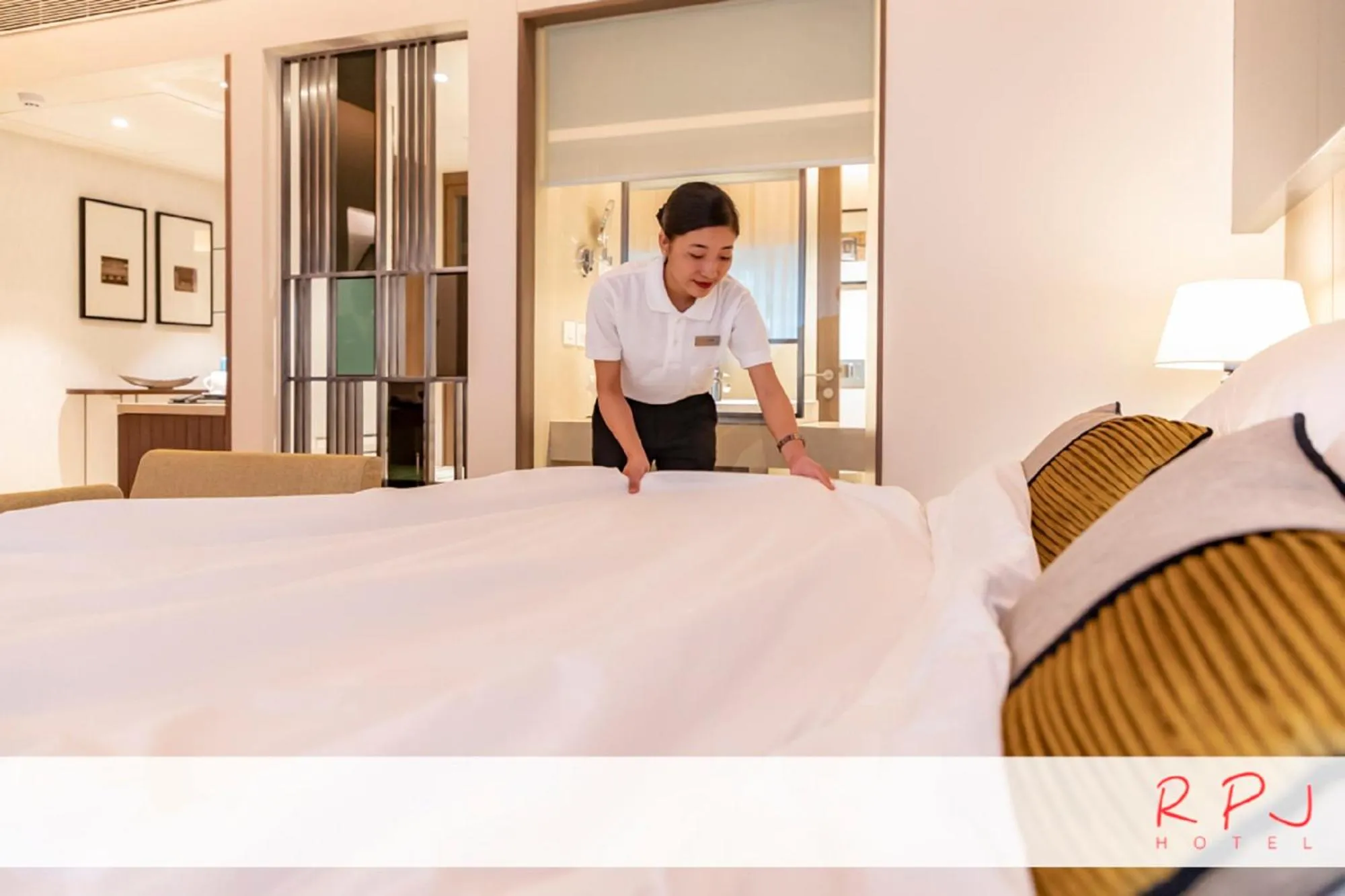 Staff, Bed in RPJ Hotel Rajkot