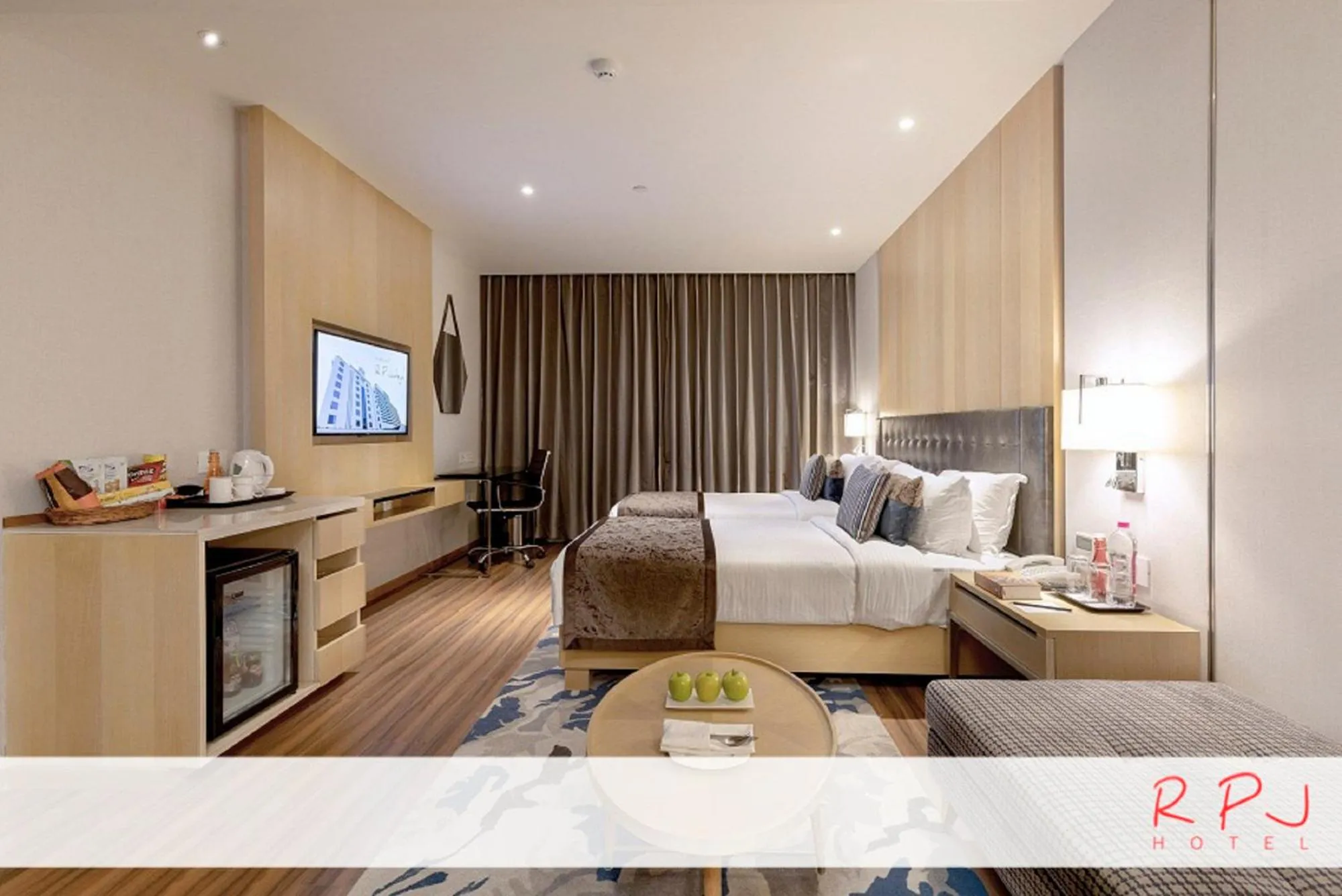 Photo of the whole room, Bed in RPJ Hotel Rajkot