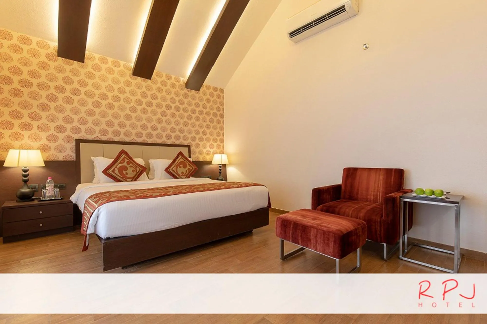 Photo of the whole room, Bed in RPJ Hotel Rajkot