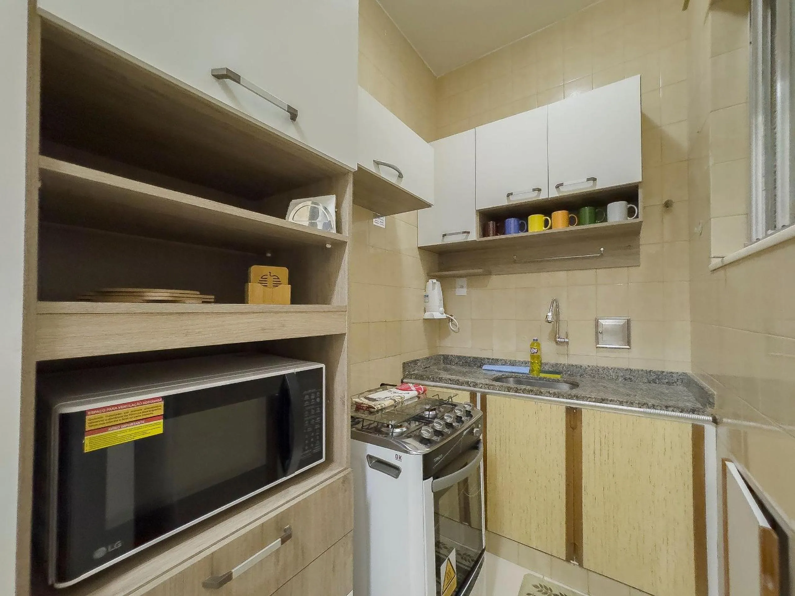 Kitchen or kitchenette in Localização Perfeita: 1Qto, 3min Orla