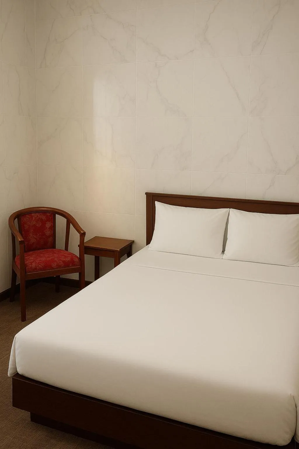 Bed in TUAN Central Hotel