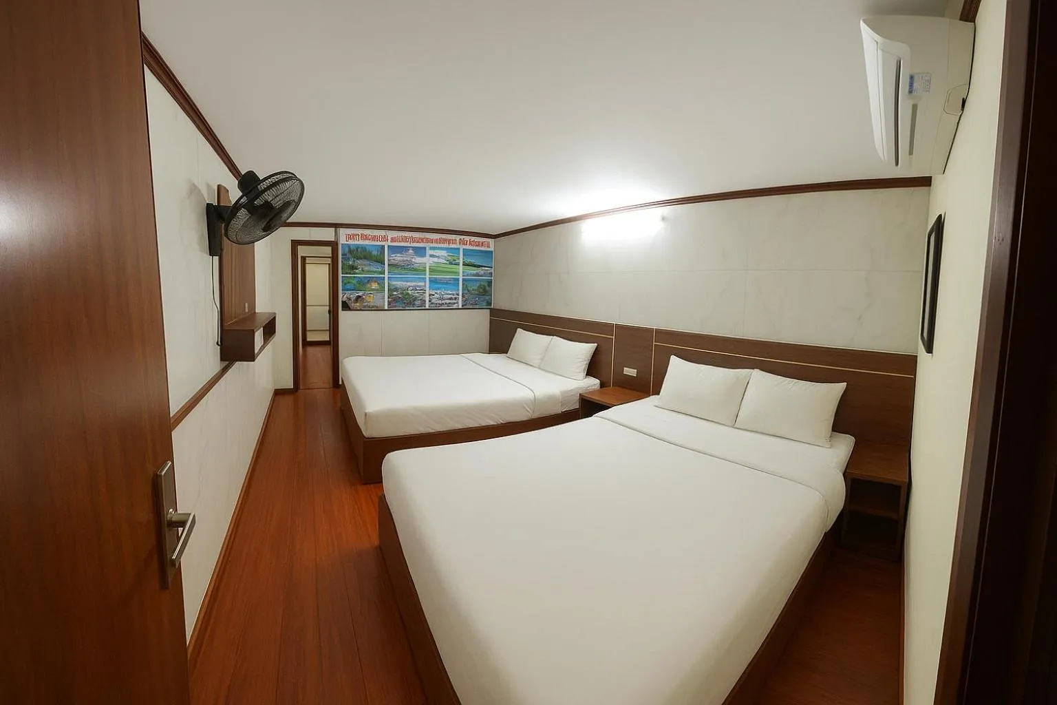 Bed in TUAN Central Hotel