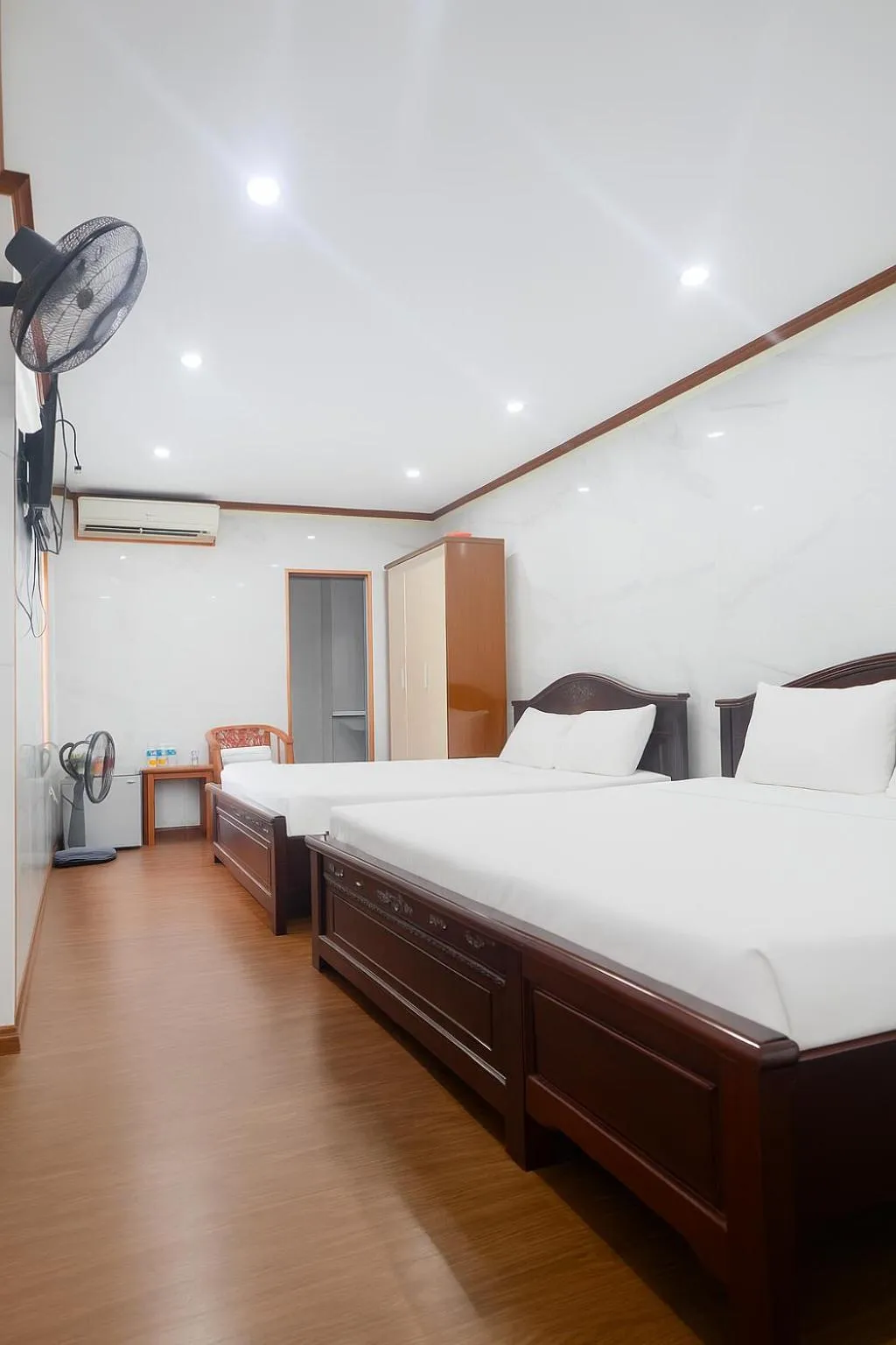 Bed in TUAN Central Hotel