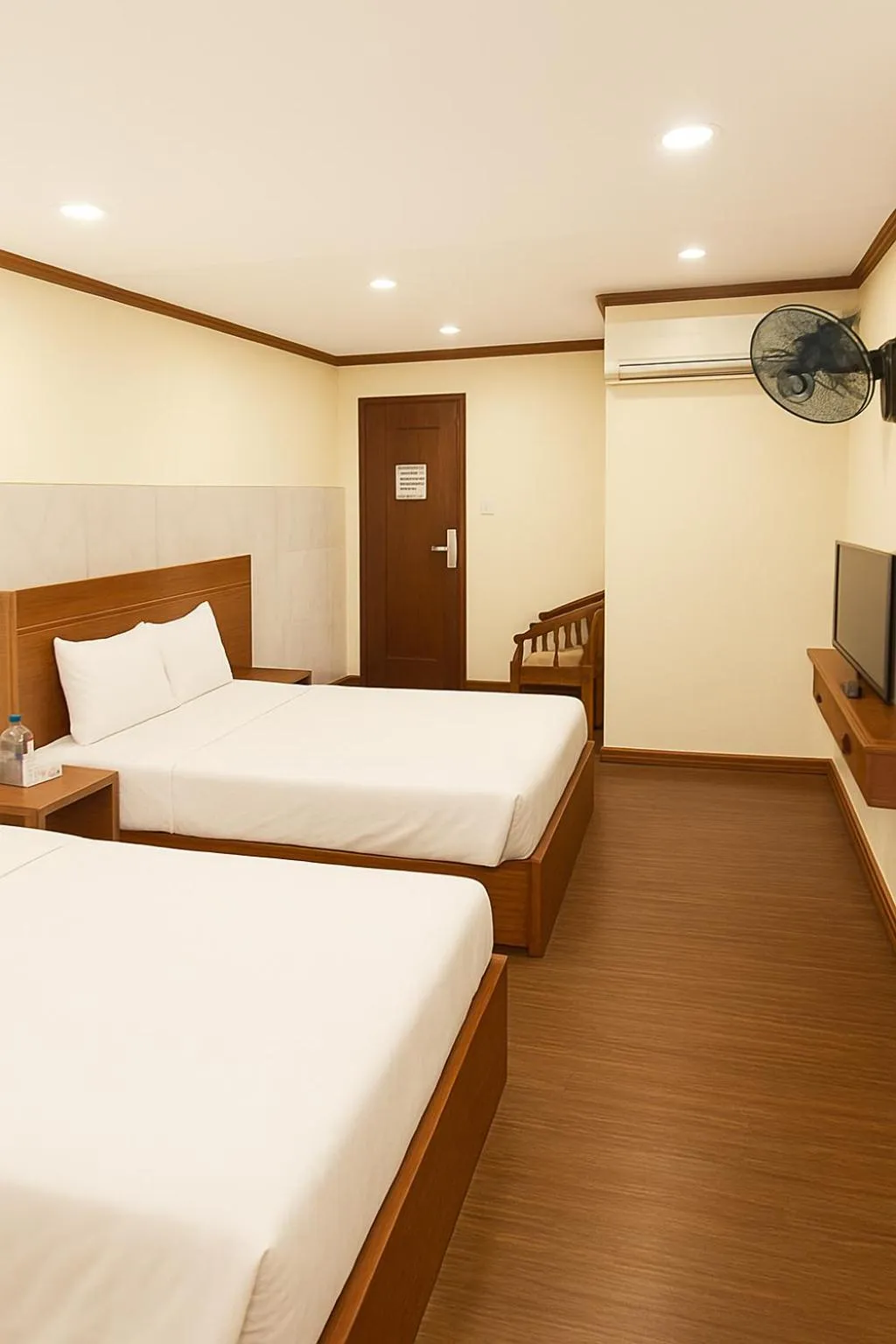 Bed in TUAN Central Hotel