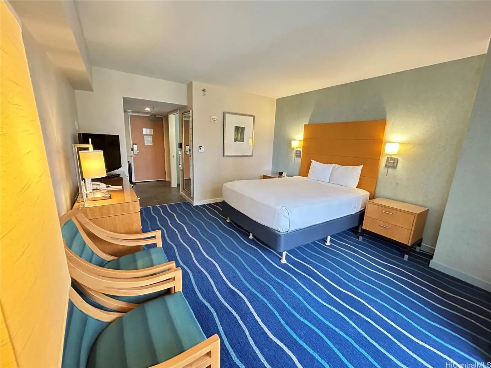 Bed in Ala Moana Hotel _ Ocean view with balcony