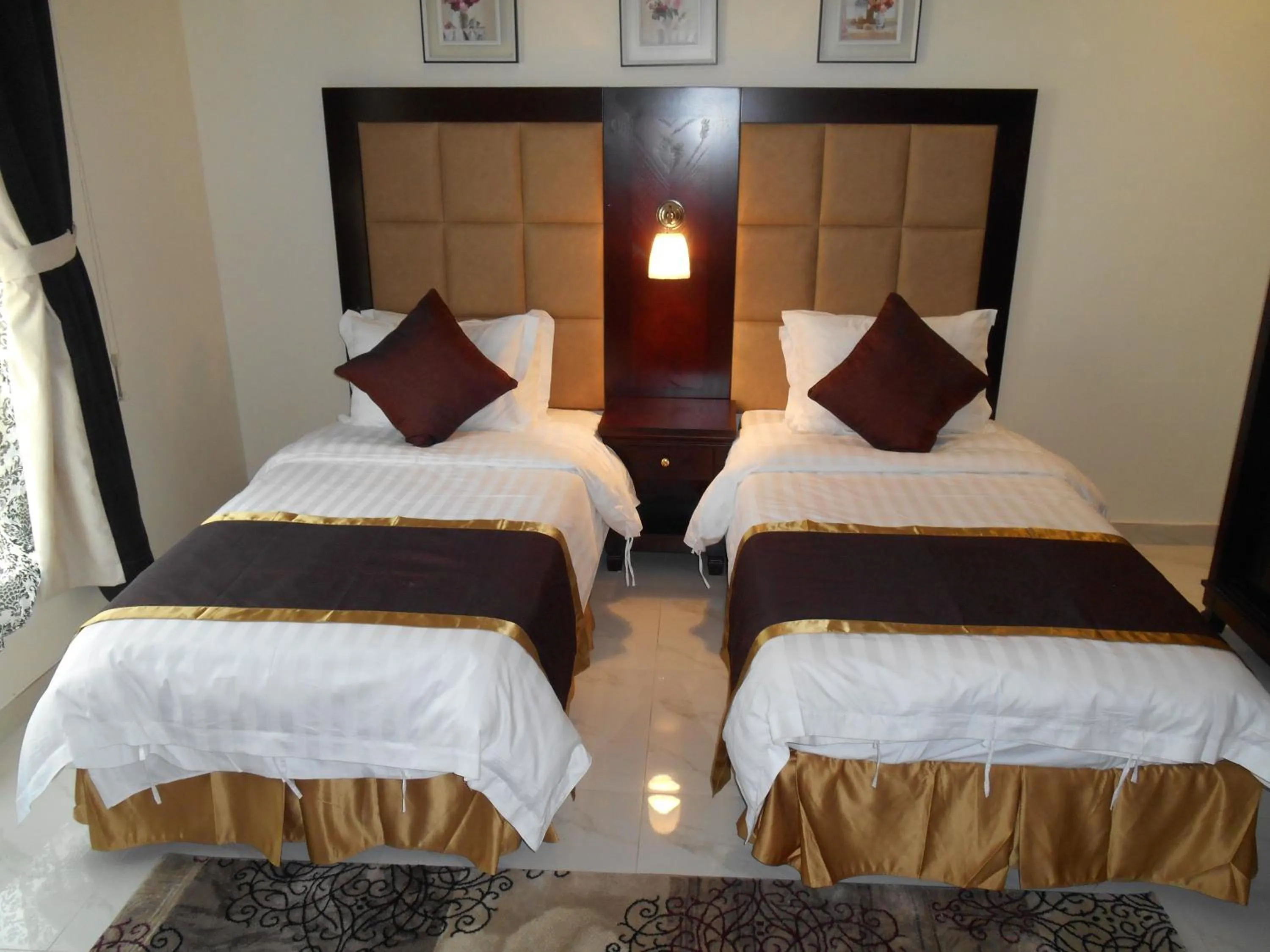 Bed in جلنار الشرق للشقق المخدومة