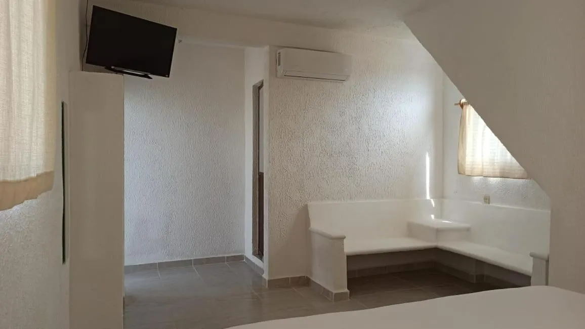 Bed in QUINTA DIAMANTE villas&hotel