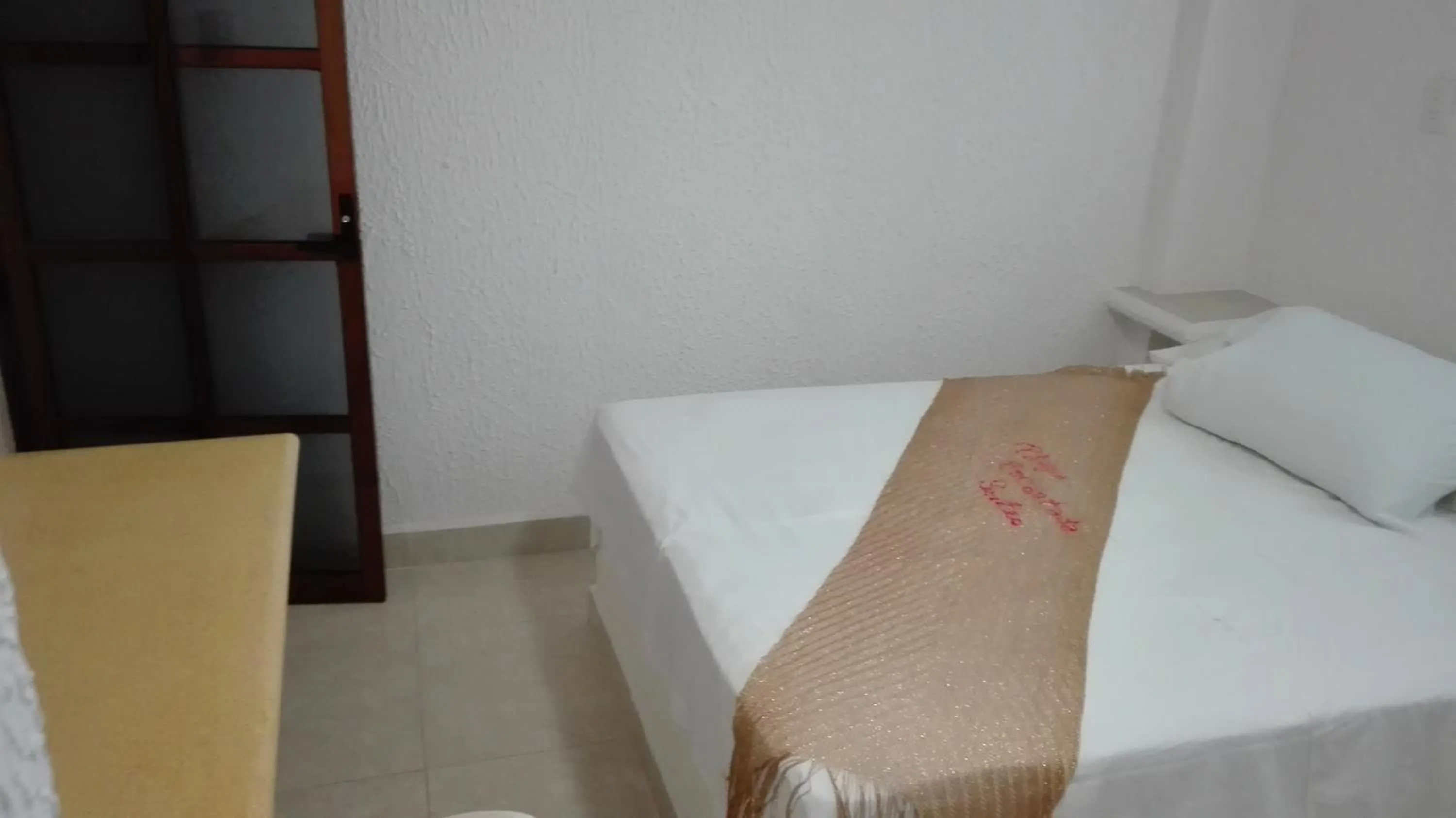 Bed in QUINTA DIAMANTE villas&hotel