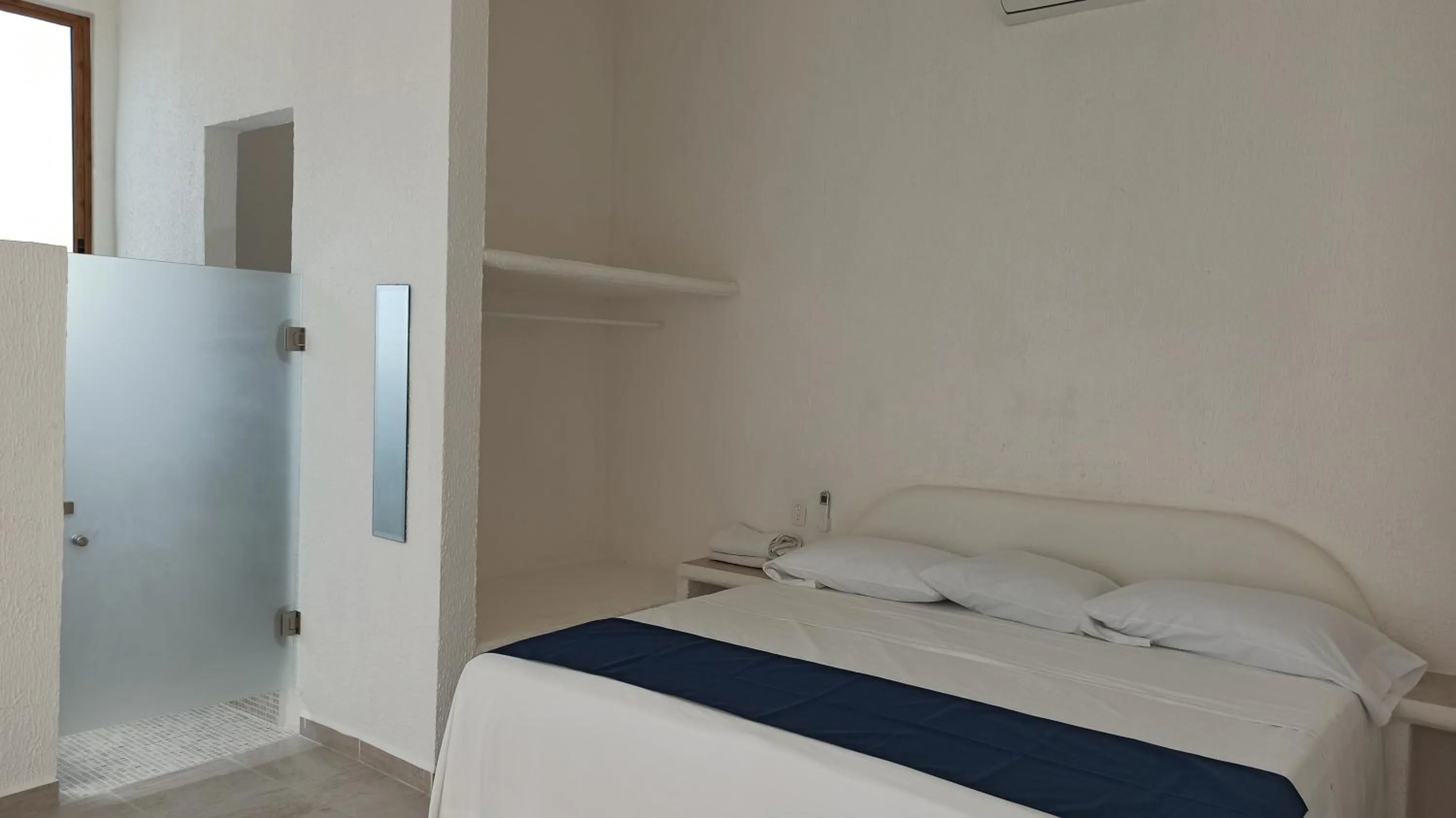 Bed in QUINTA DIAMANTE villas&hotel