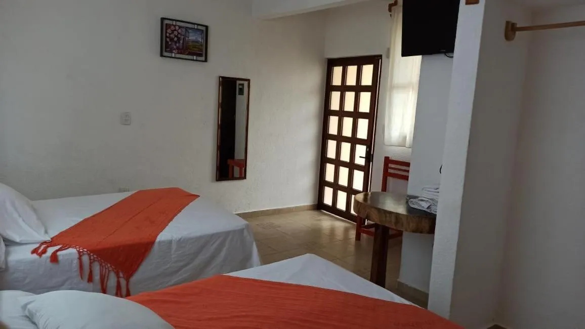 Bed in QUINTA DIAMANTE villas&hotel